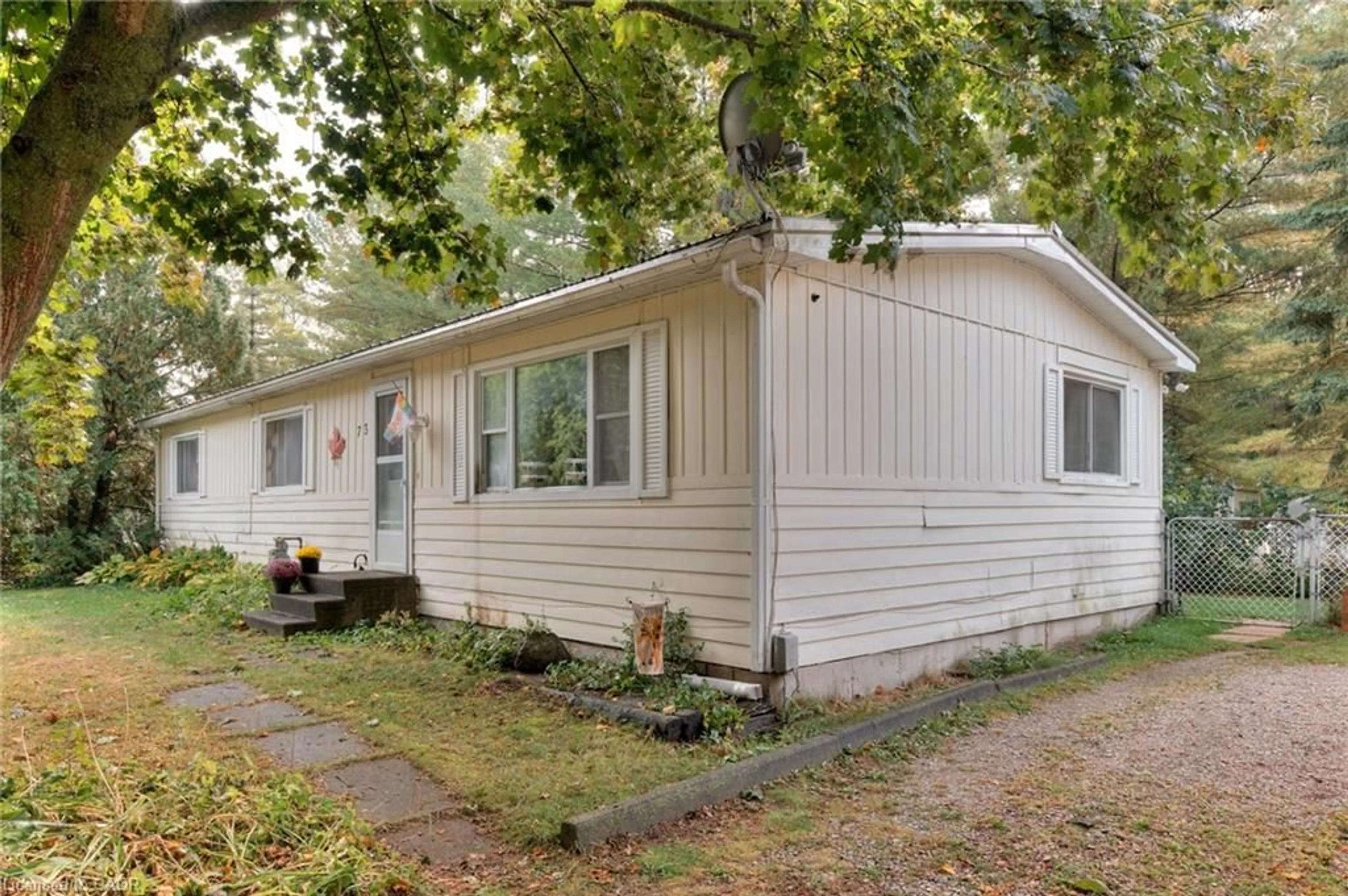 Home with vinyl exterior material, street for 746112 Township Road 4 #73, Woodstock Ontario N4S 7V9