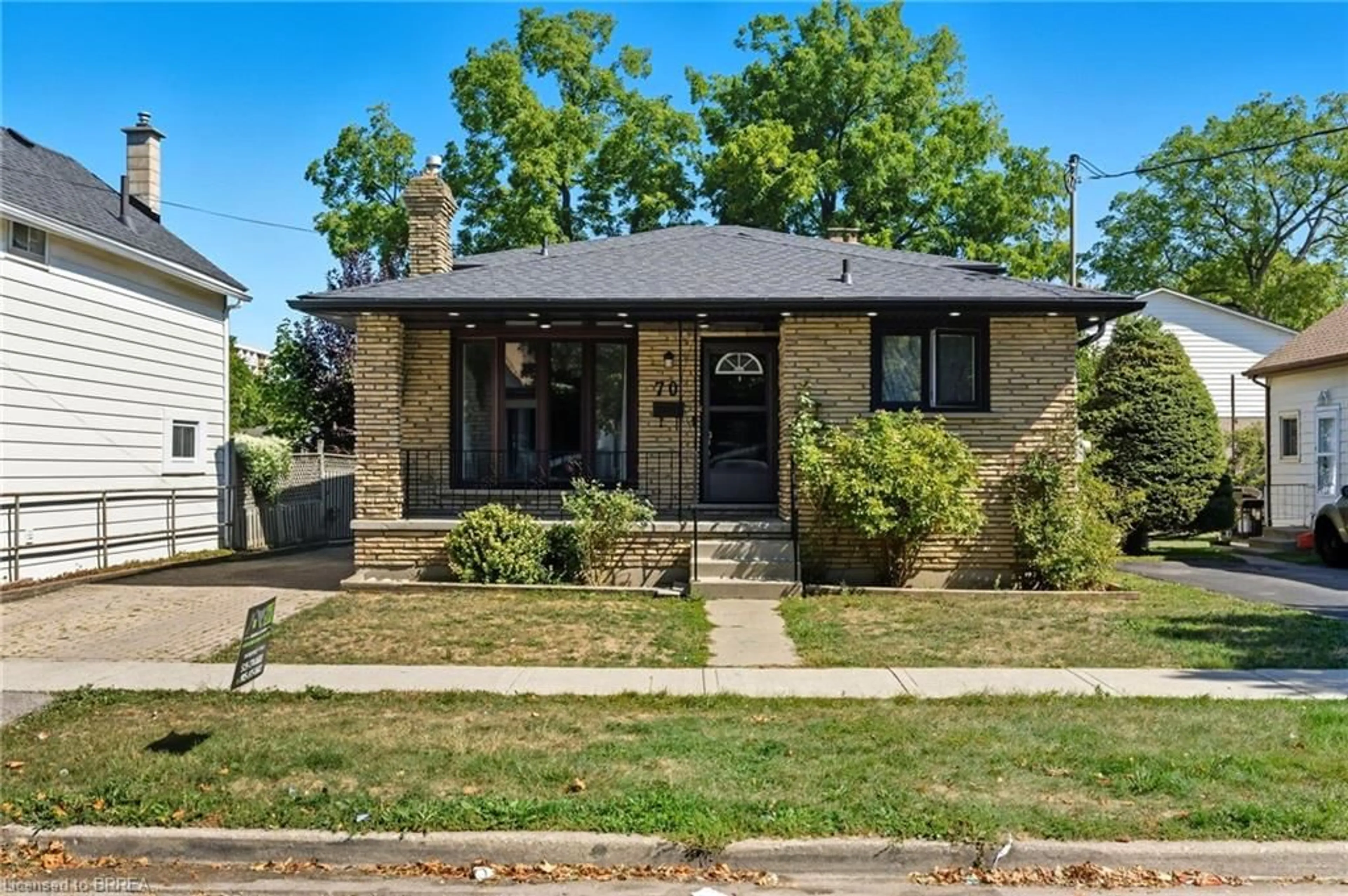 Home with brick exterior material, street for 70 Oak St, Brantford Ontario N3T 2B1