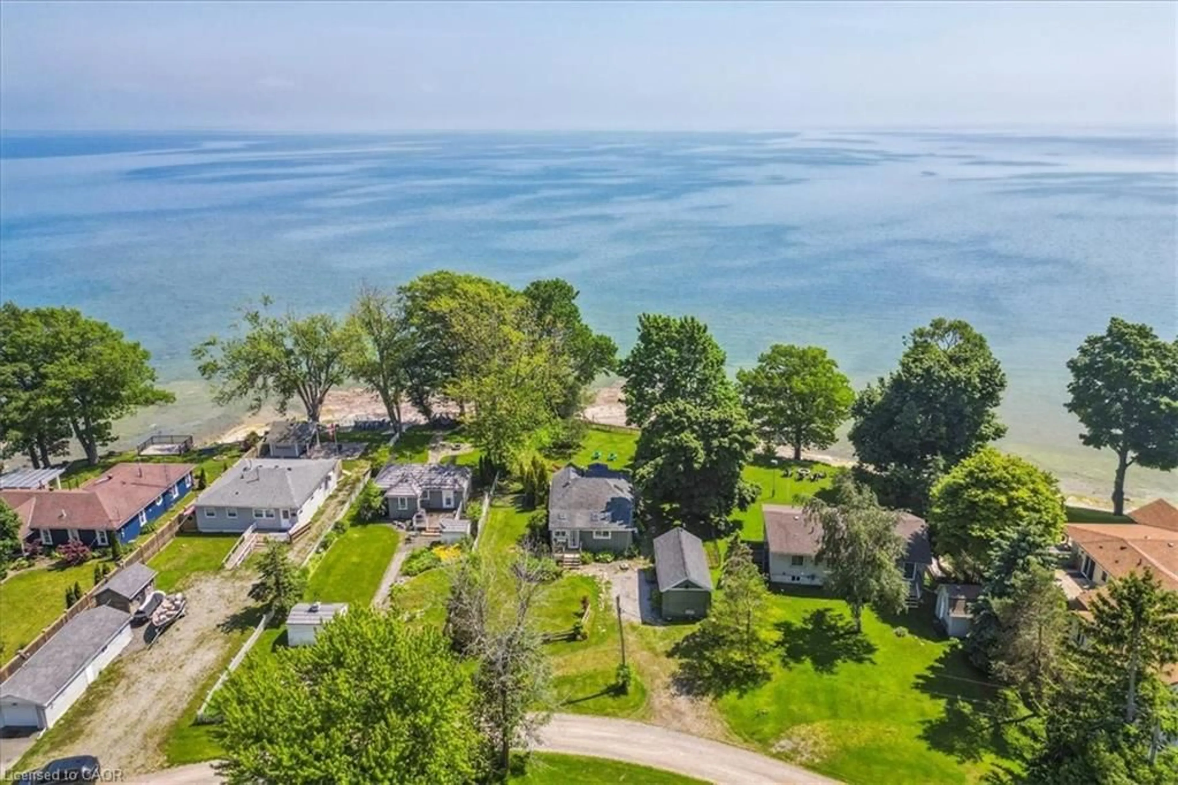 A pic from outside/outdoor area/front of a property/back of a property/a pic from drone, water/lake/river/ocean view for 40 Hoover Point Lane, Selkirk Ontario N0A 1P0