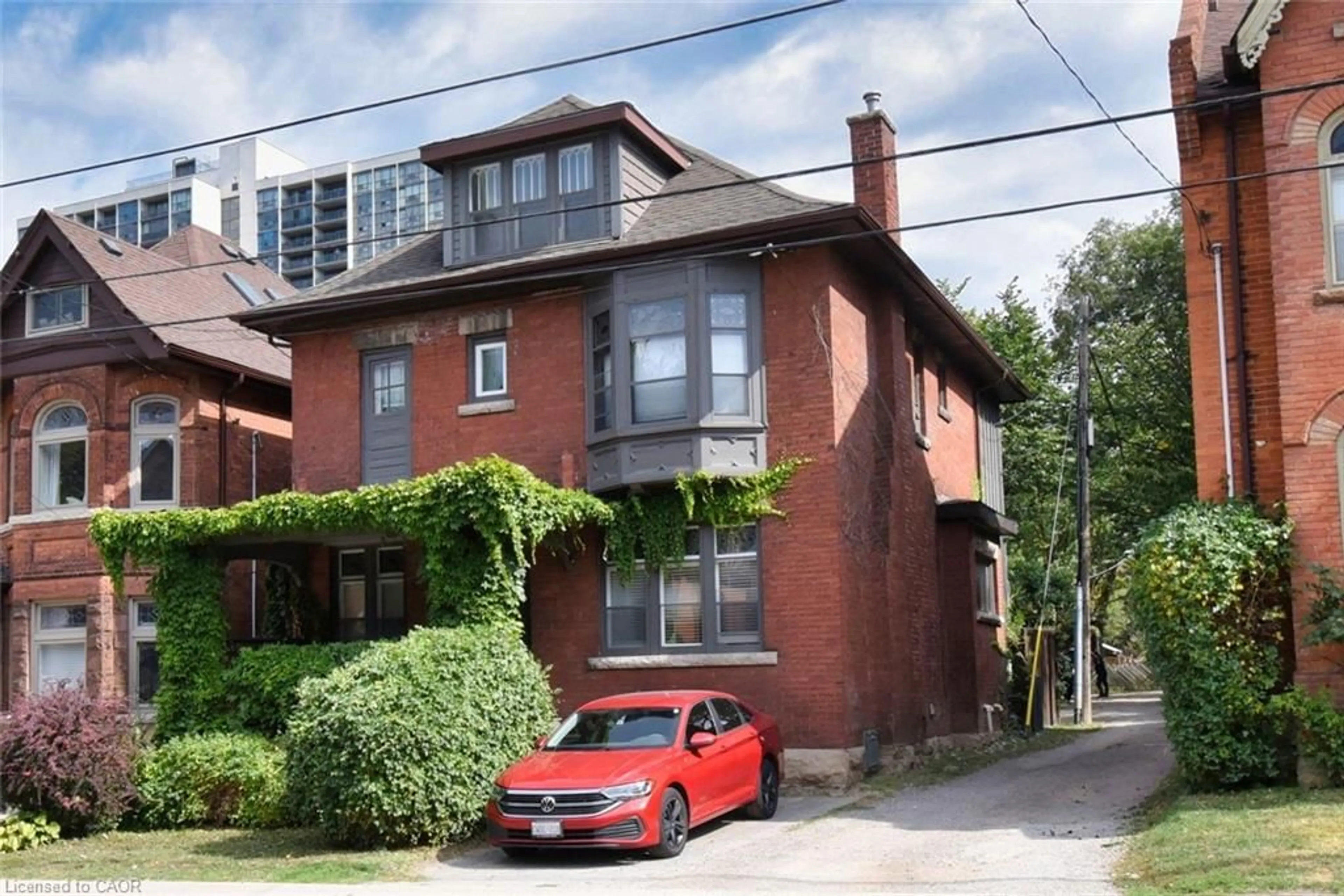 Home with brick exterior material, street for 217 Caroline St, Hamilton Ontario L8P 3L5