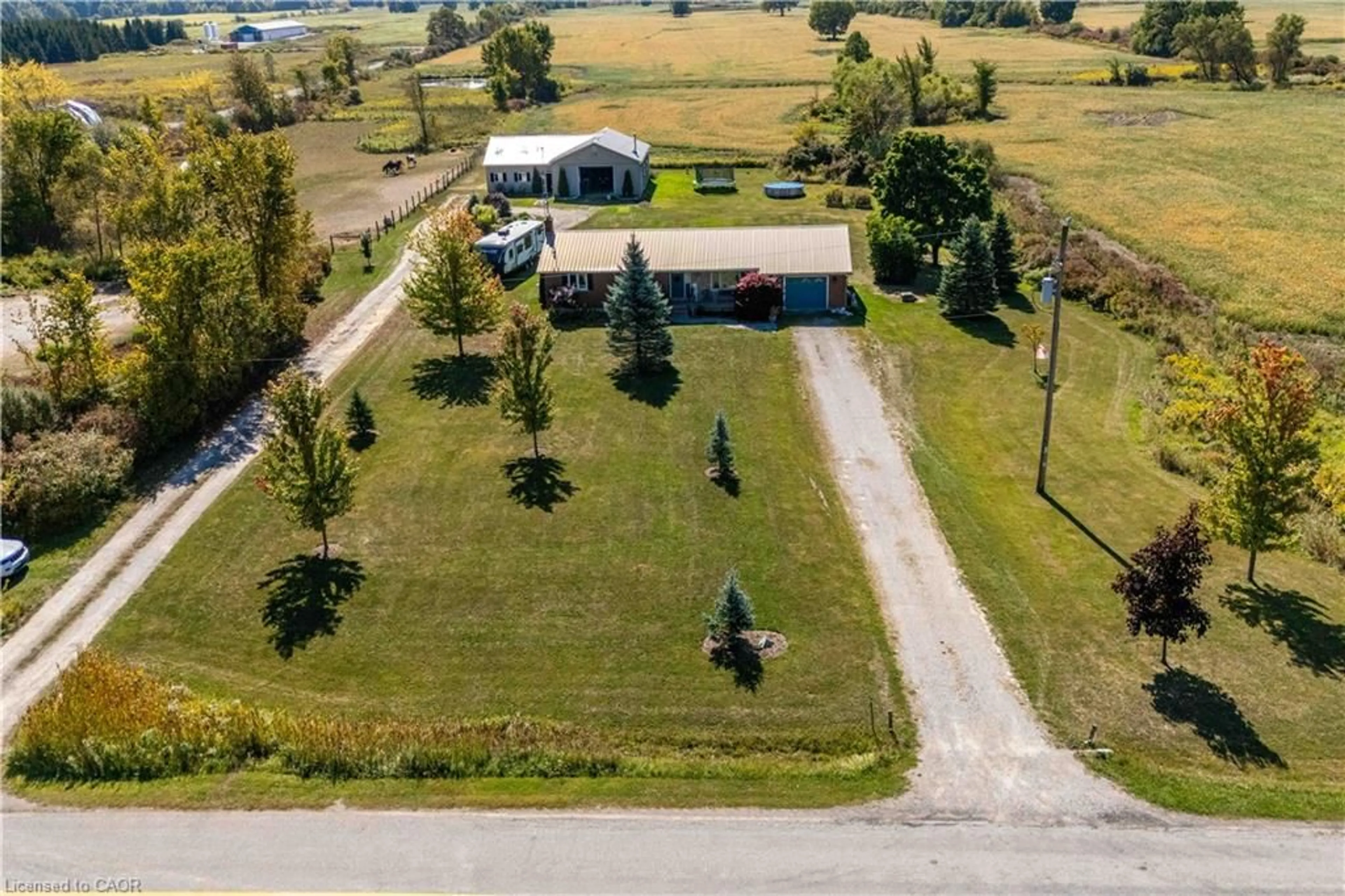 A pic from outside/outdoor area/front of a property/back of a property/a pic from drone, unknown for 558 Indiana Rd, Canfield Ontario N0A 1C0