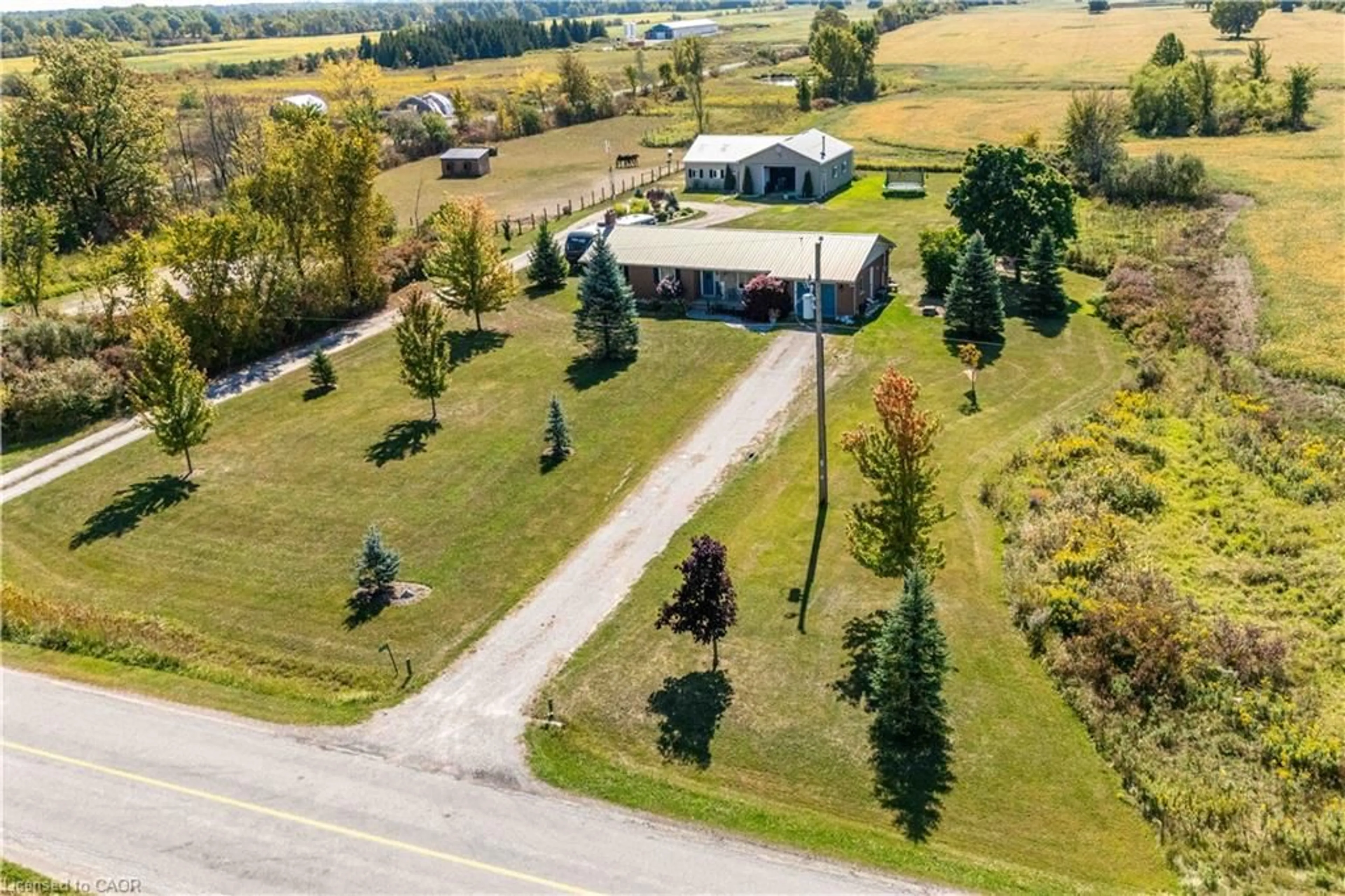 A pic from outside/outdoor area/front of a property/back of a property/a pic from drone, unknown for 558 Indiana Rd, Canfield Ontario N0A 1C0