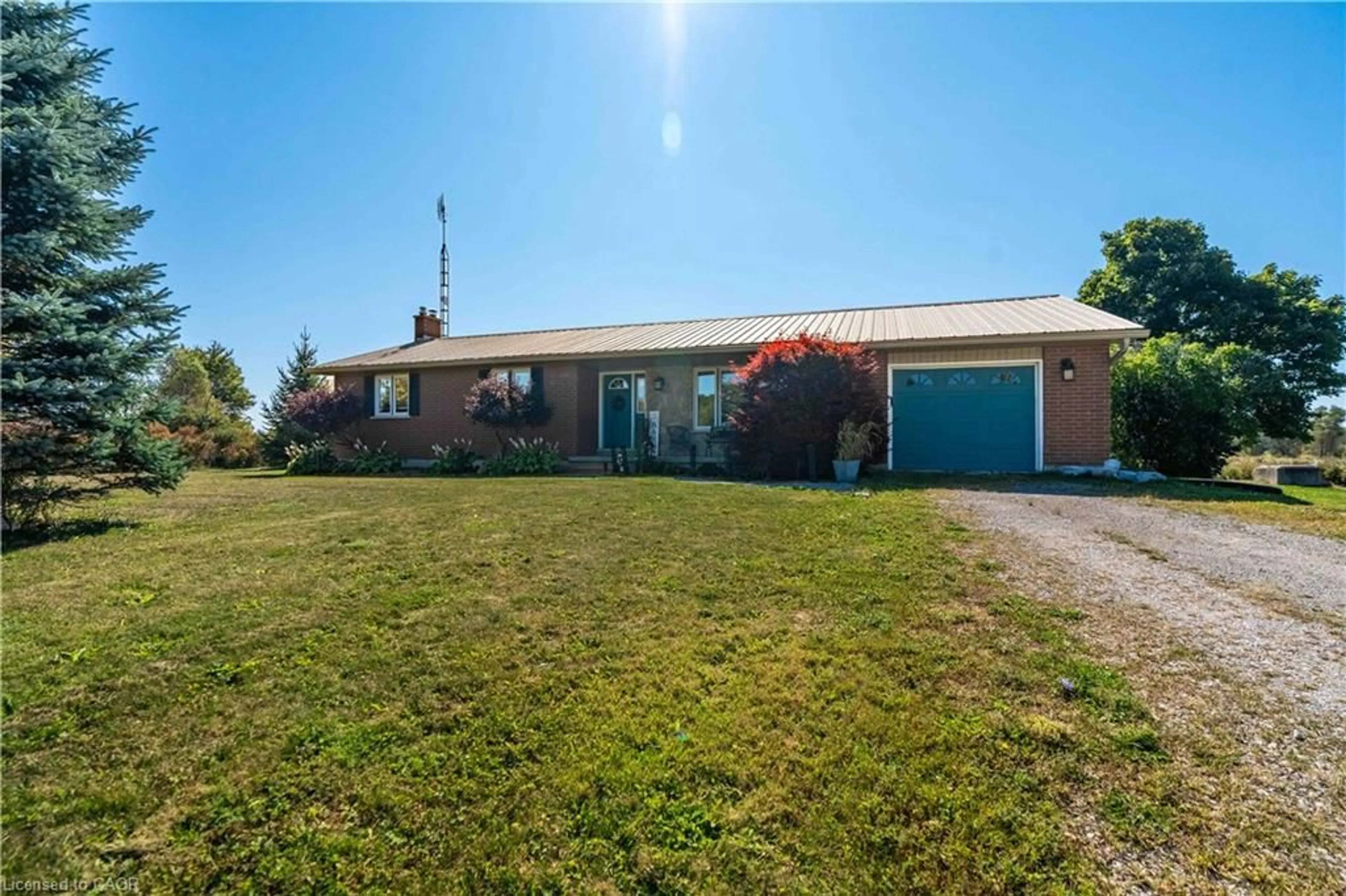 A pic from outside/outdoor area/front of a property/back of a property/a pic from drone, unknown for 558 Indiana Rd, Canfield Ontario N0A 1C0