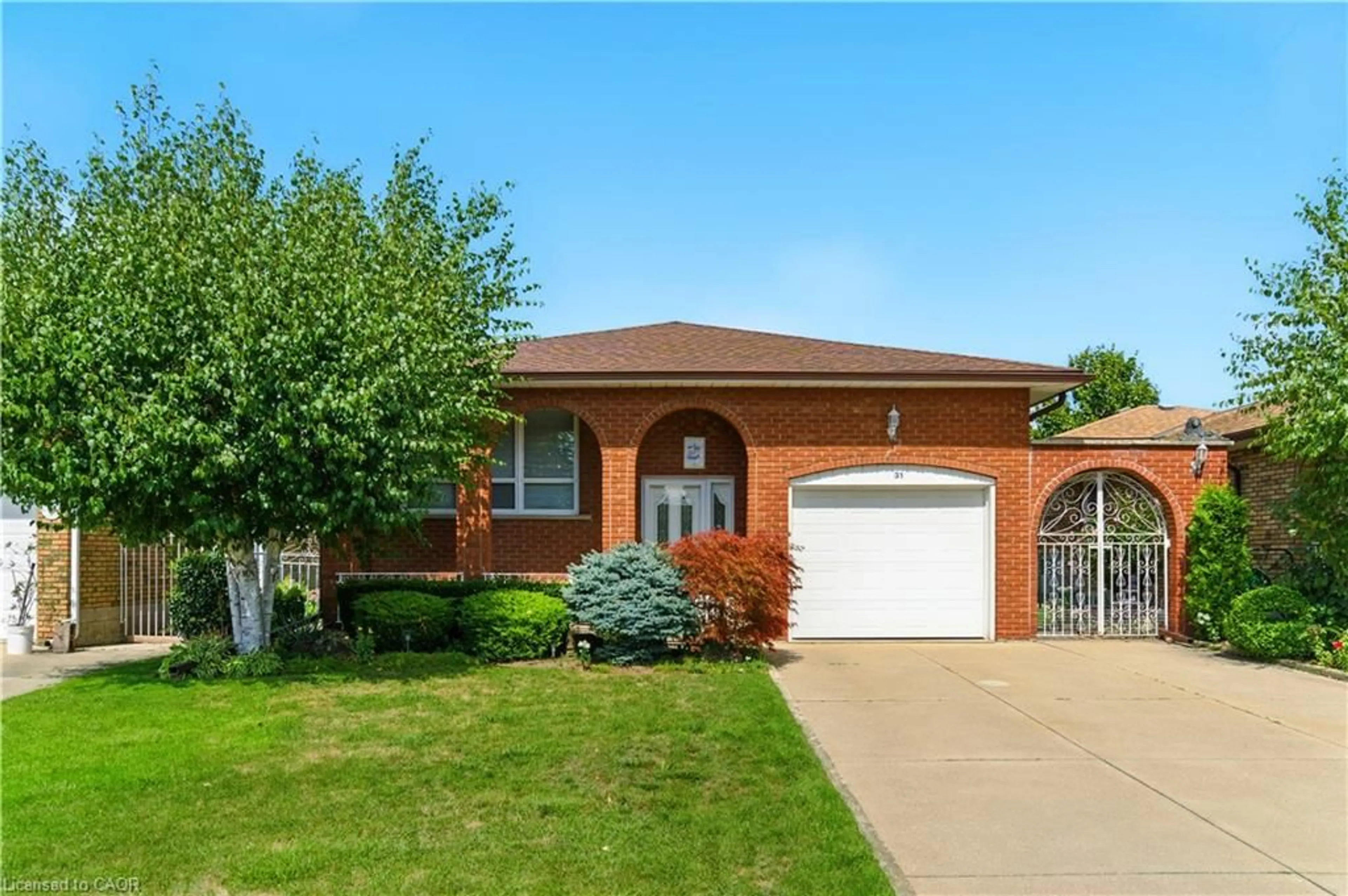 Home with brick exterior material, street for 31 Village Dr, Hamilton Ontario L8E 3M9