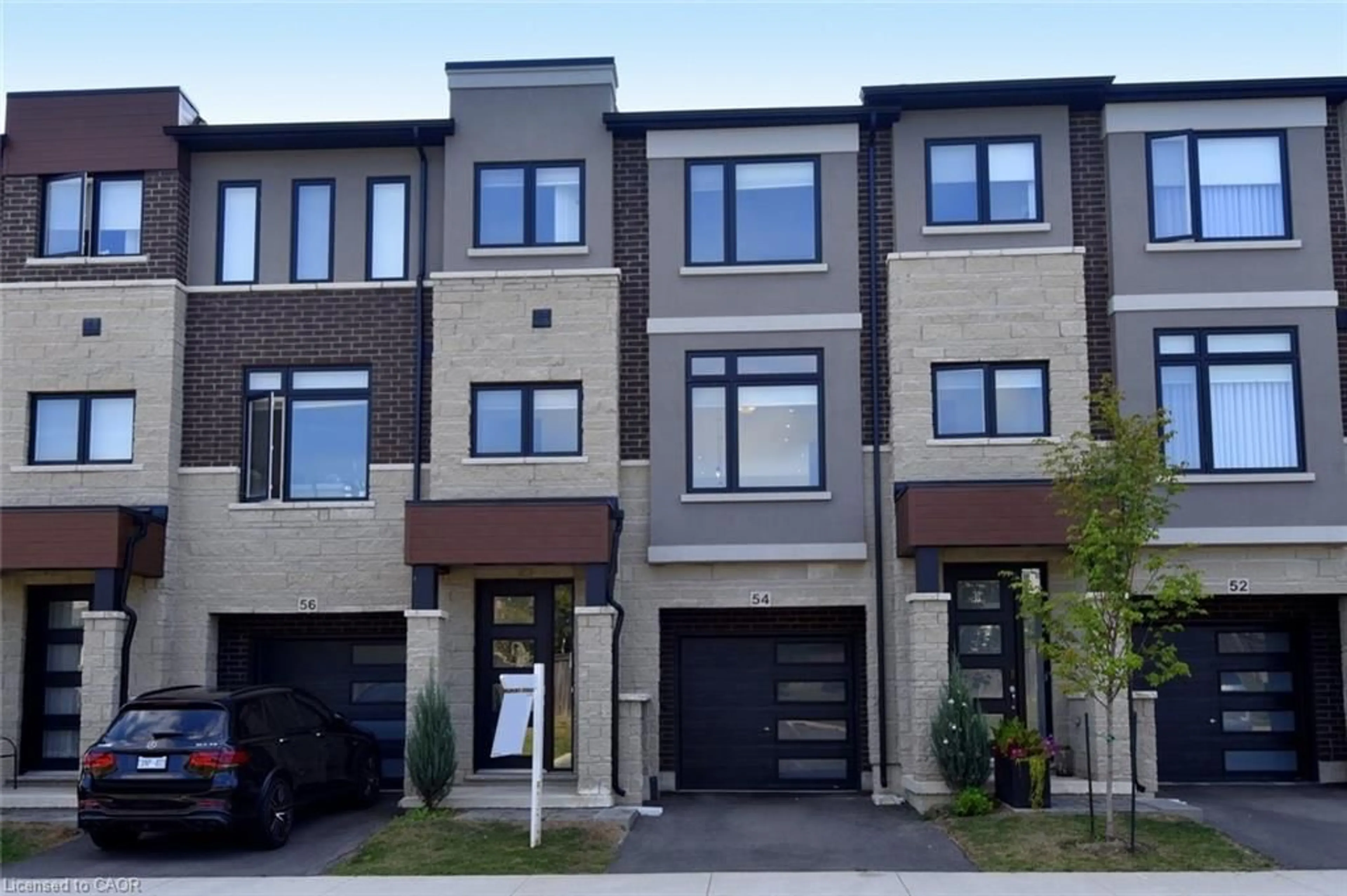 Home with brick exterior material, street for 54 Capstone Lane, Hamilton Ontario L9C 0E8