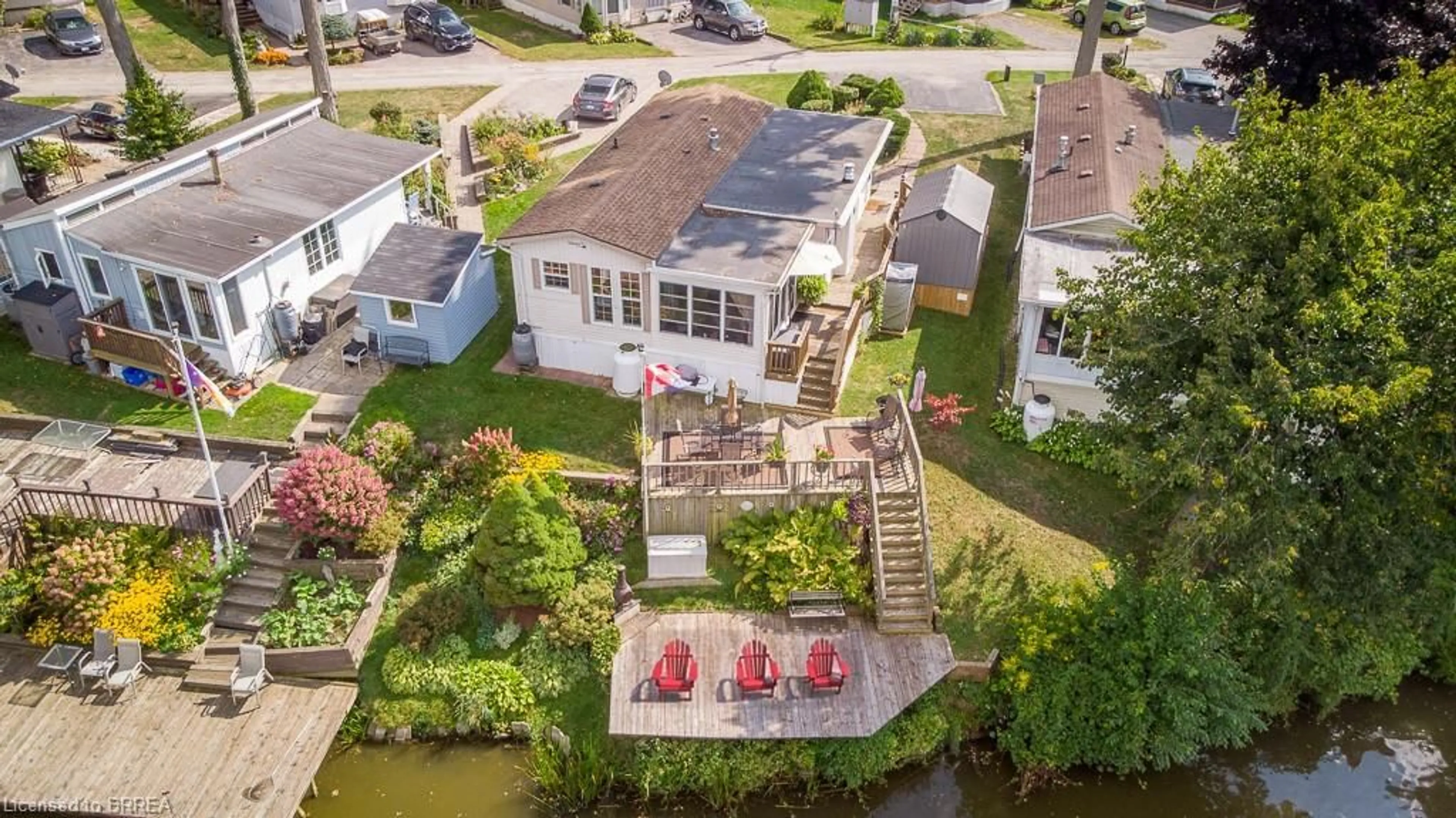 A pic from outside/outdoor area/front of a property/back of a property/a pic from drone, water/lake/river/ocean view for 2490 Governor's Rd #17, Copetown Ontario L0R 1T0