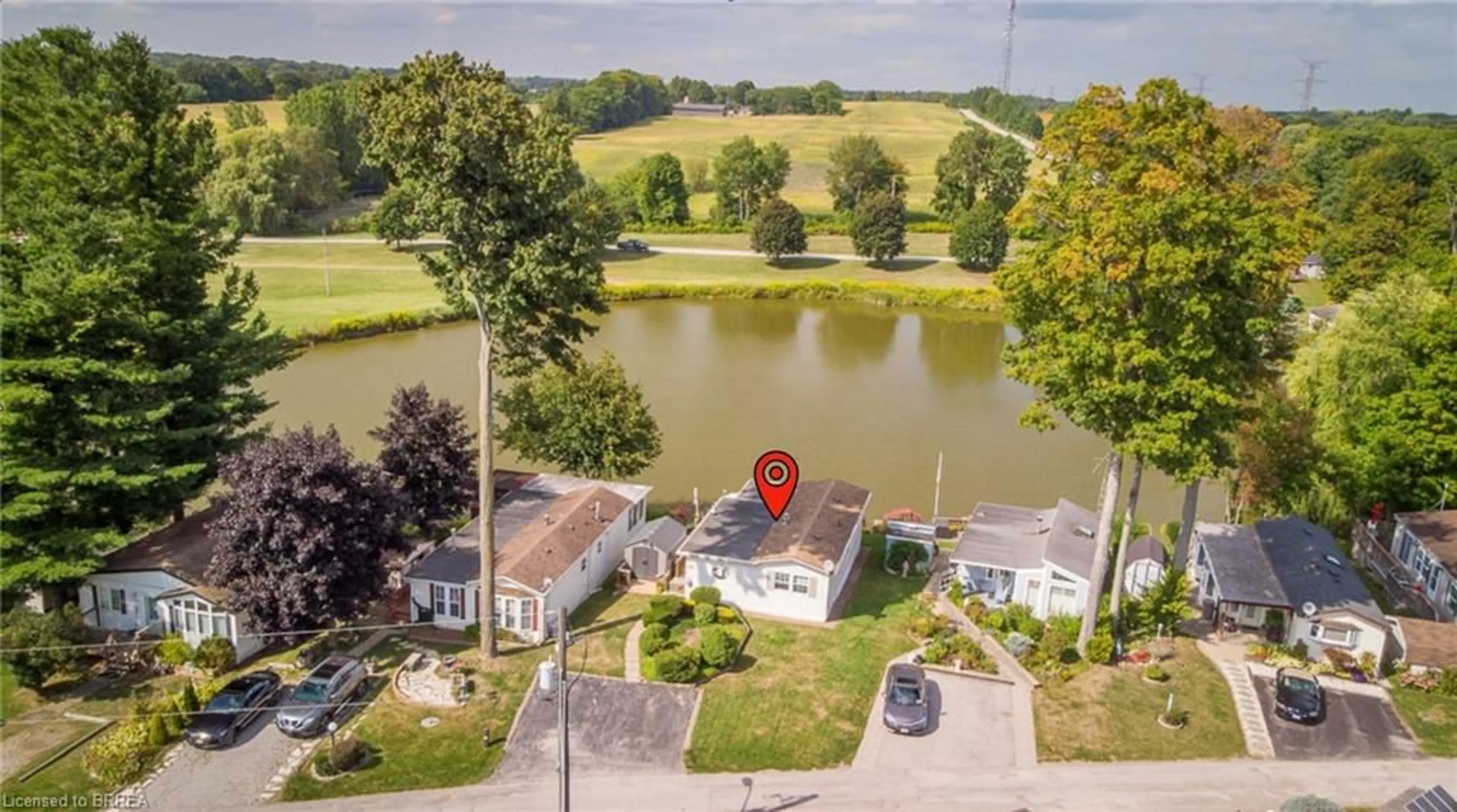 A pic from outside/outdoor area/front of a property/back of a property/a pic from drone, water/lake/river/ocean view for 2490 Governor's Rd #17, Copetown Ontario L0R 1T0