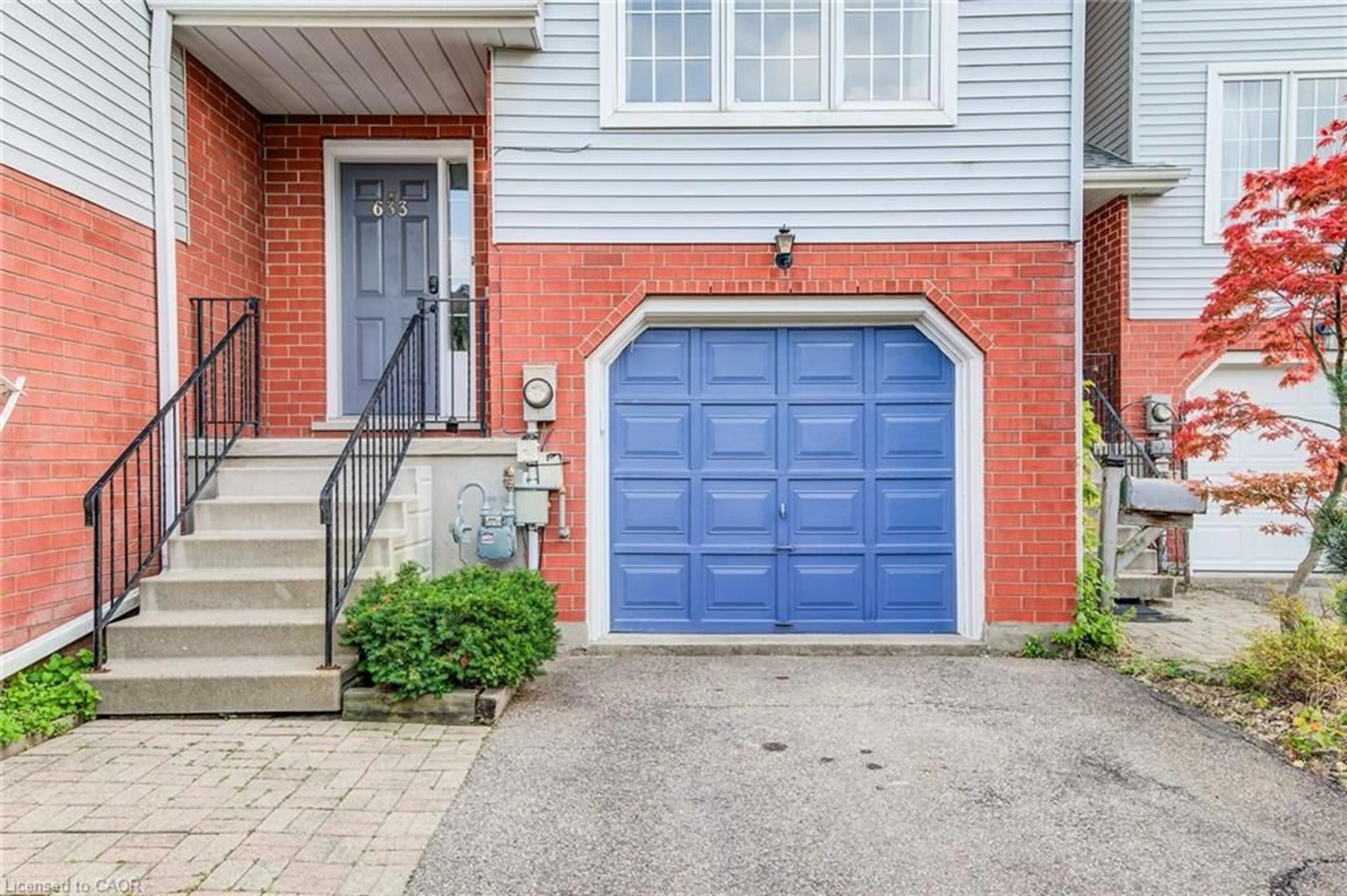 Home with brick exterior material, street for 633 Grange Cres, Waterloo Ontario N2T 2L9