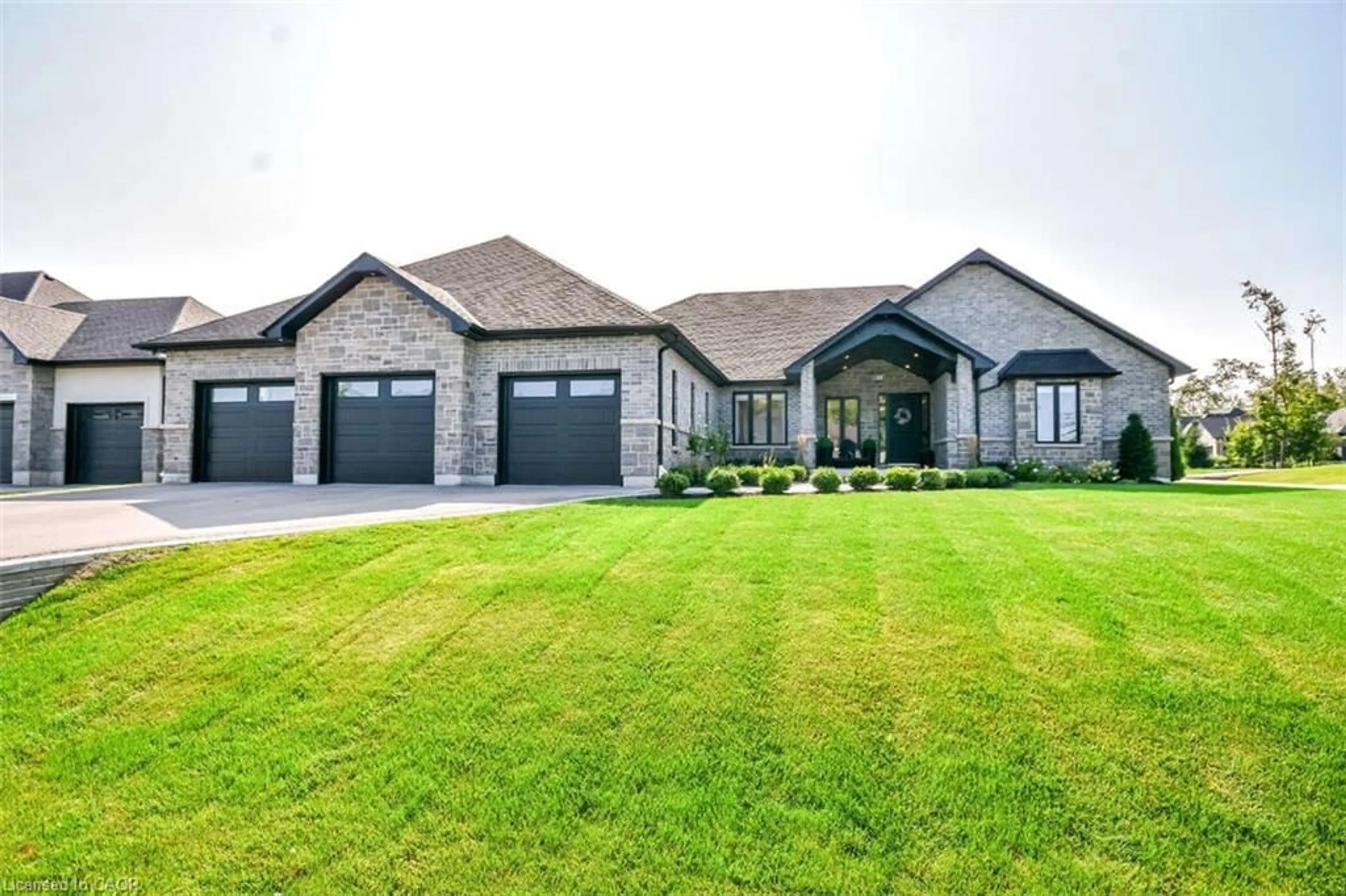 Home with brick exterior material, street for 1 Morrison Place Pl, Springwater Ontario L9X 2A6