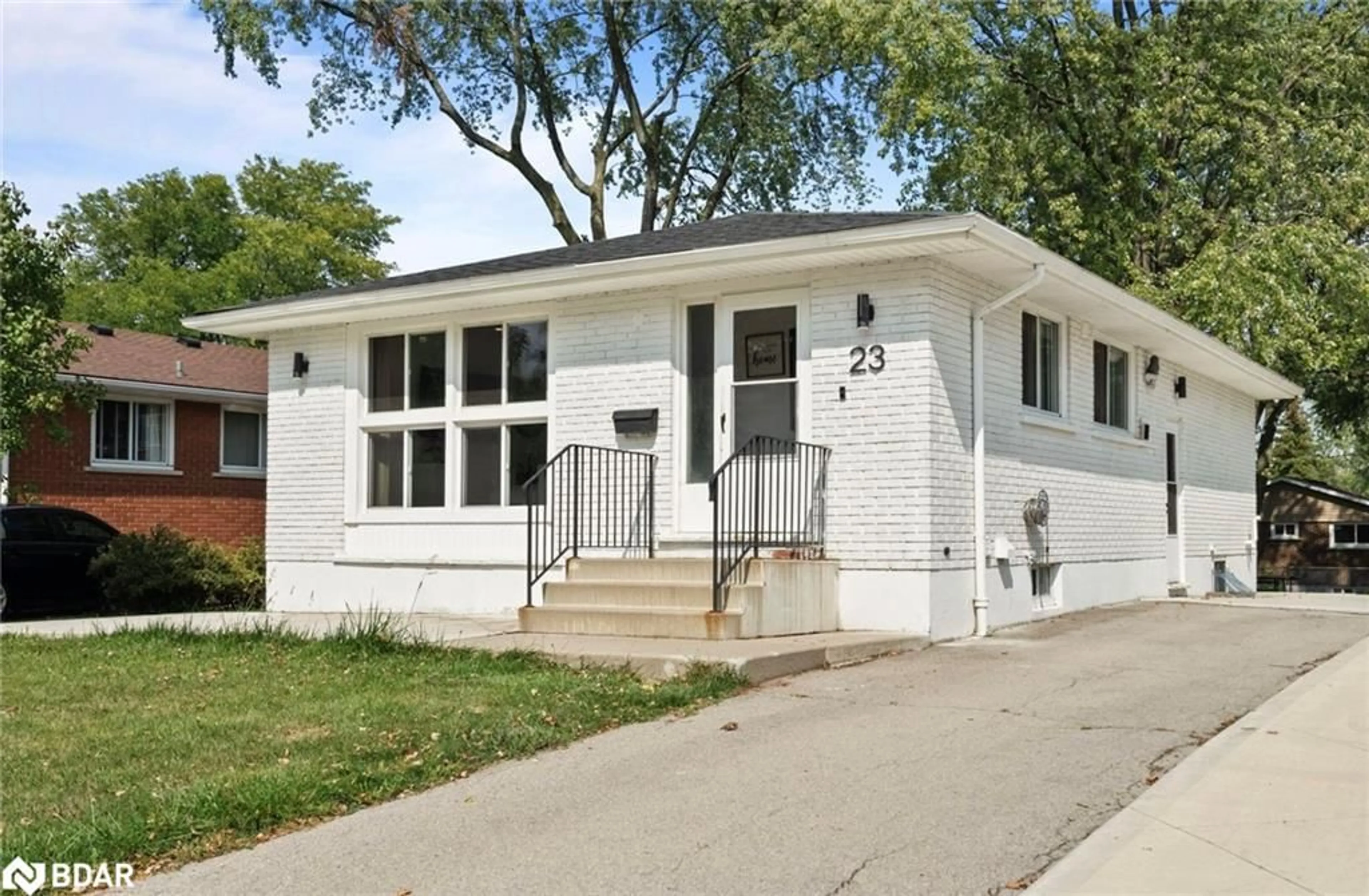 Home with vinyl exterior material, street for 23 Thorley Dr, Hamilton Ontario L8T 2Y9