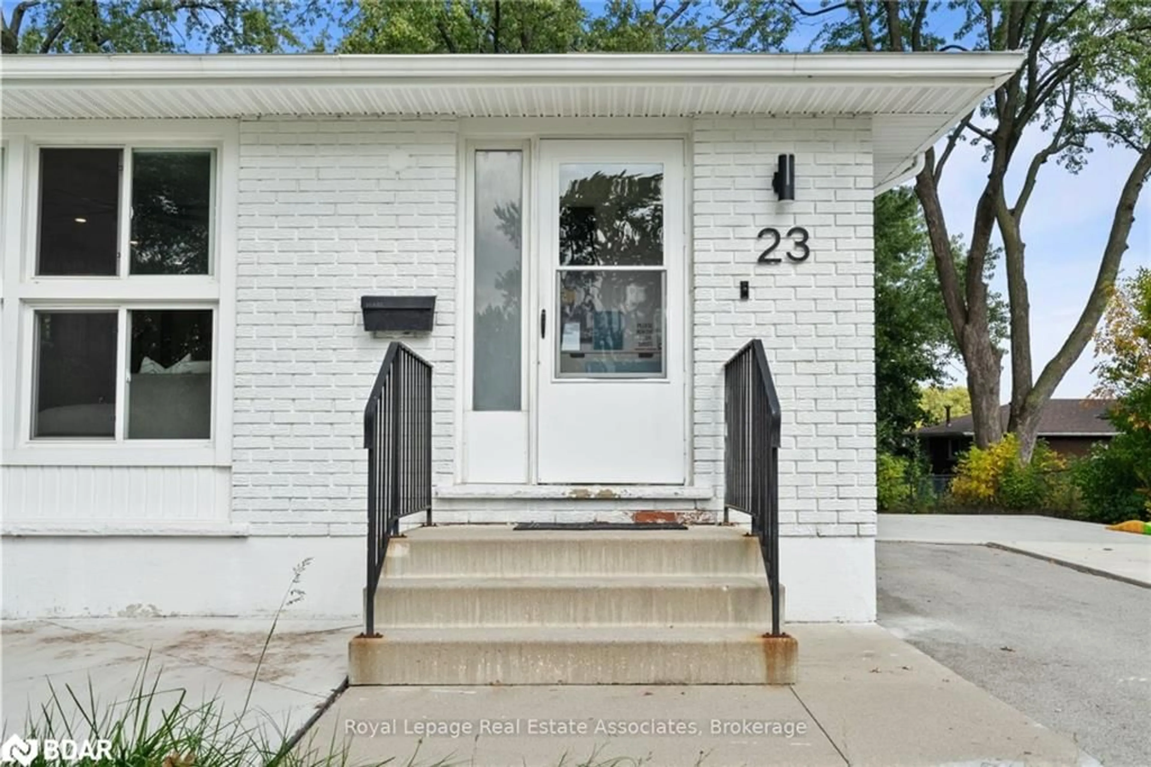 Home with brick exterior material, street for 23 Thorley Dr, Hamilton Ontario L8T 2Y9