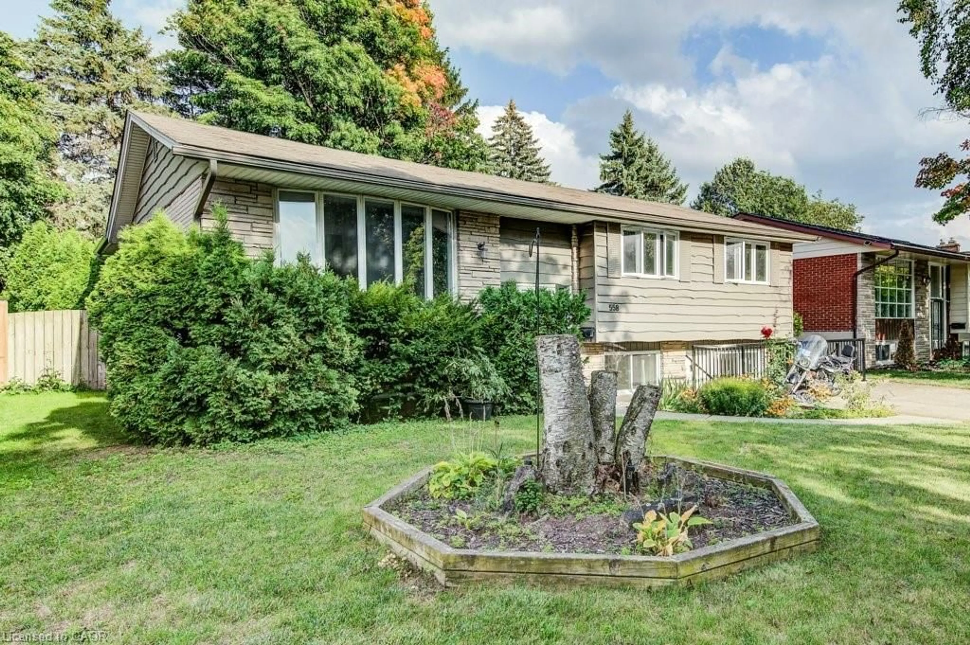 Home with vinyl exterior material, street for 558 Sprucehill Ave, Waterloo Ontario N2L 4V7
