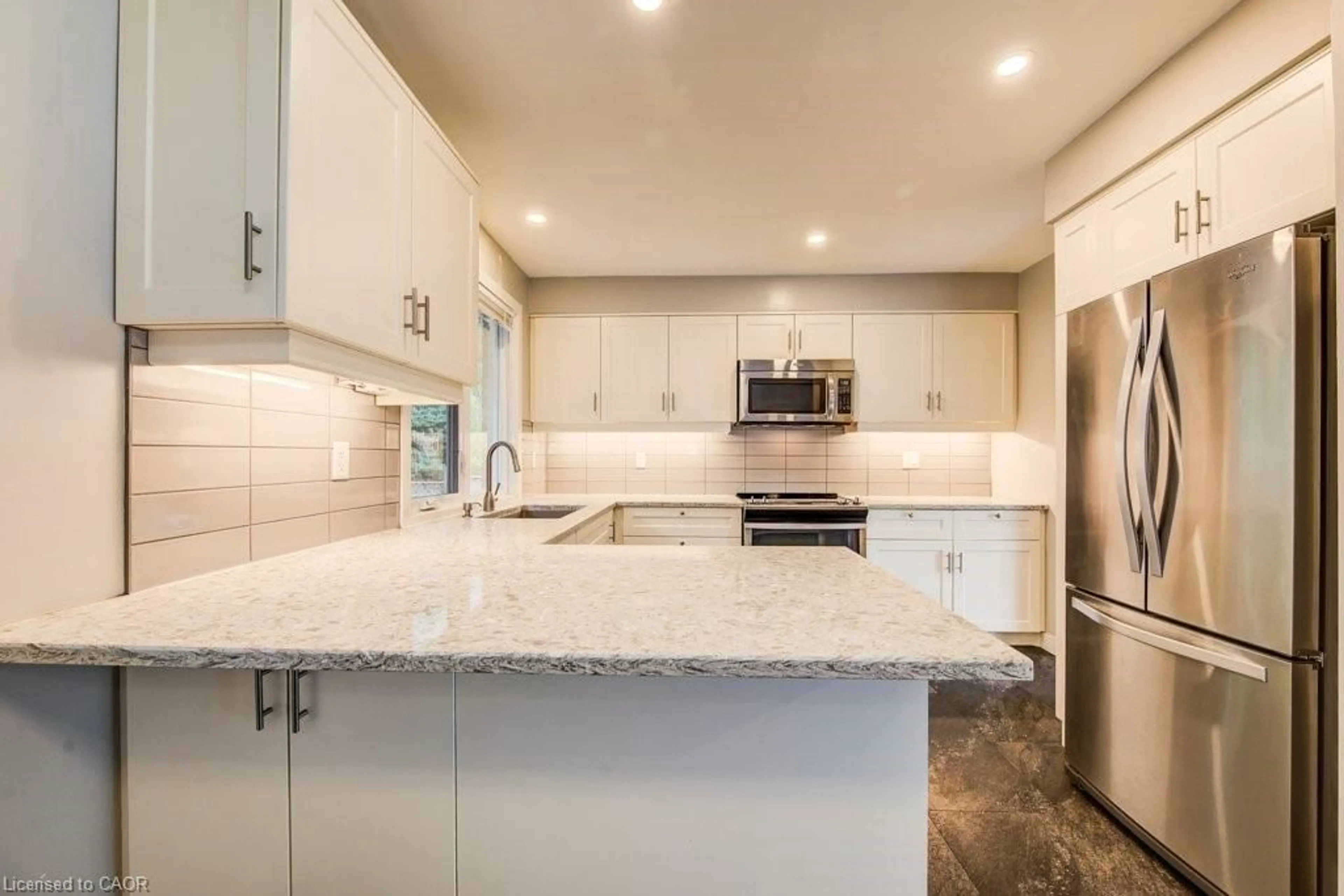 Open concept kitchen, ceramic/tile floor for 558 Sprucehill Ave, Waterloo Ontario N2L 4V7