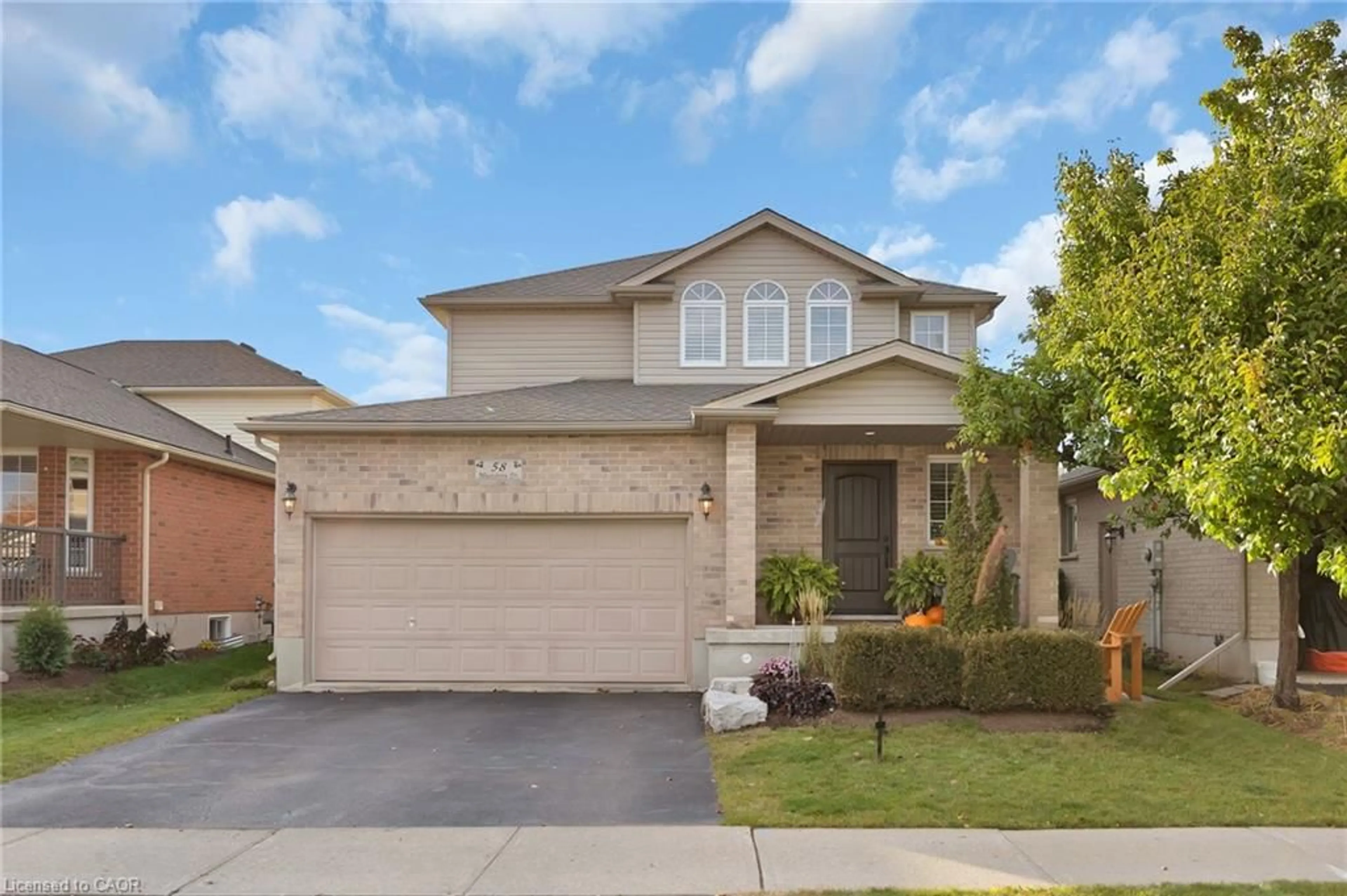 Home with brick exterior material, street for 58 Muscovey Dr, Elmira Ontario N3B 3M6