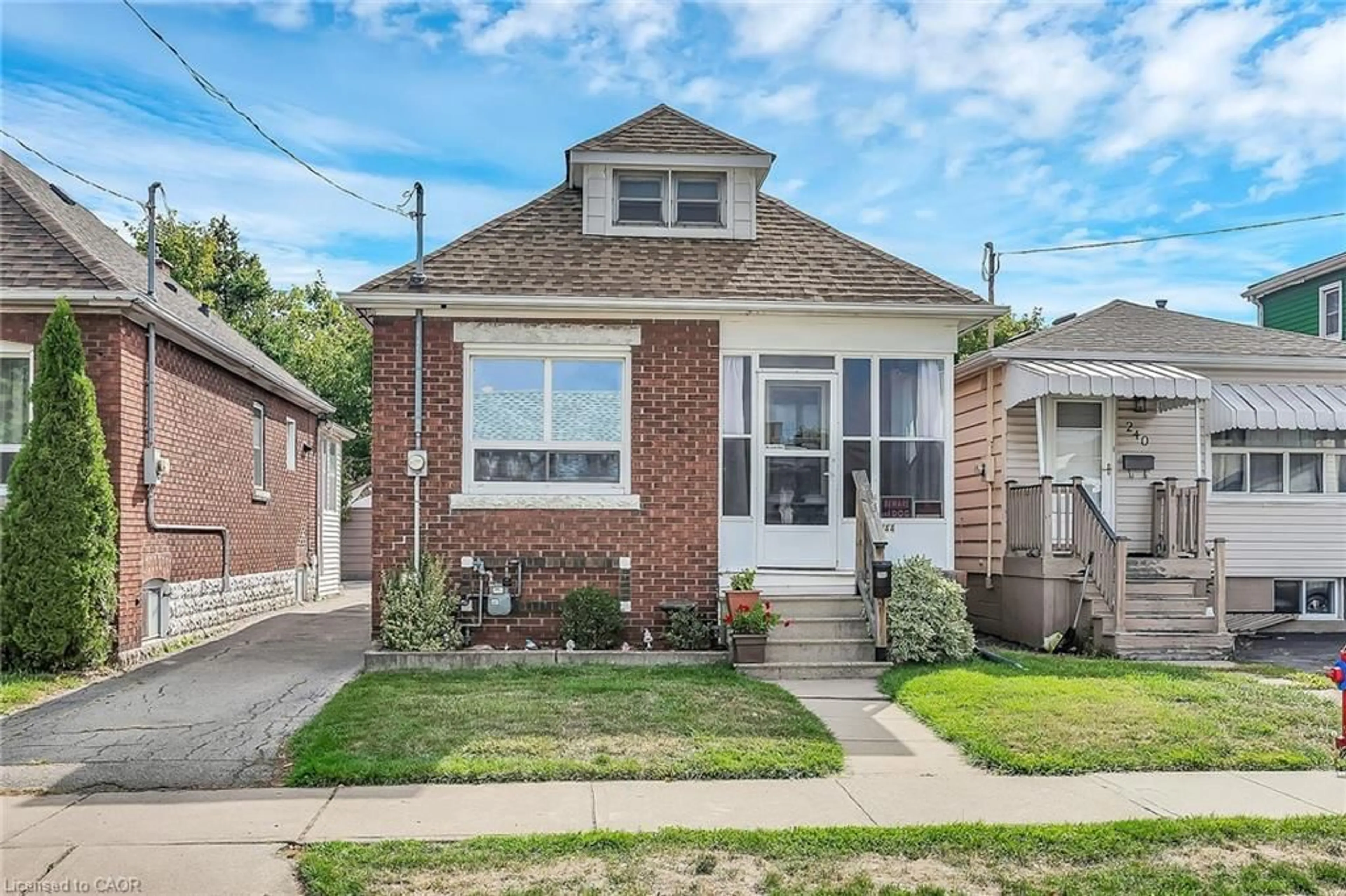 Home with brick exterior material, street for 244 Cope St, Hamilton Ontario L8H 5B5