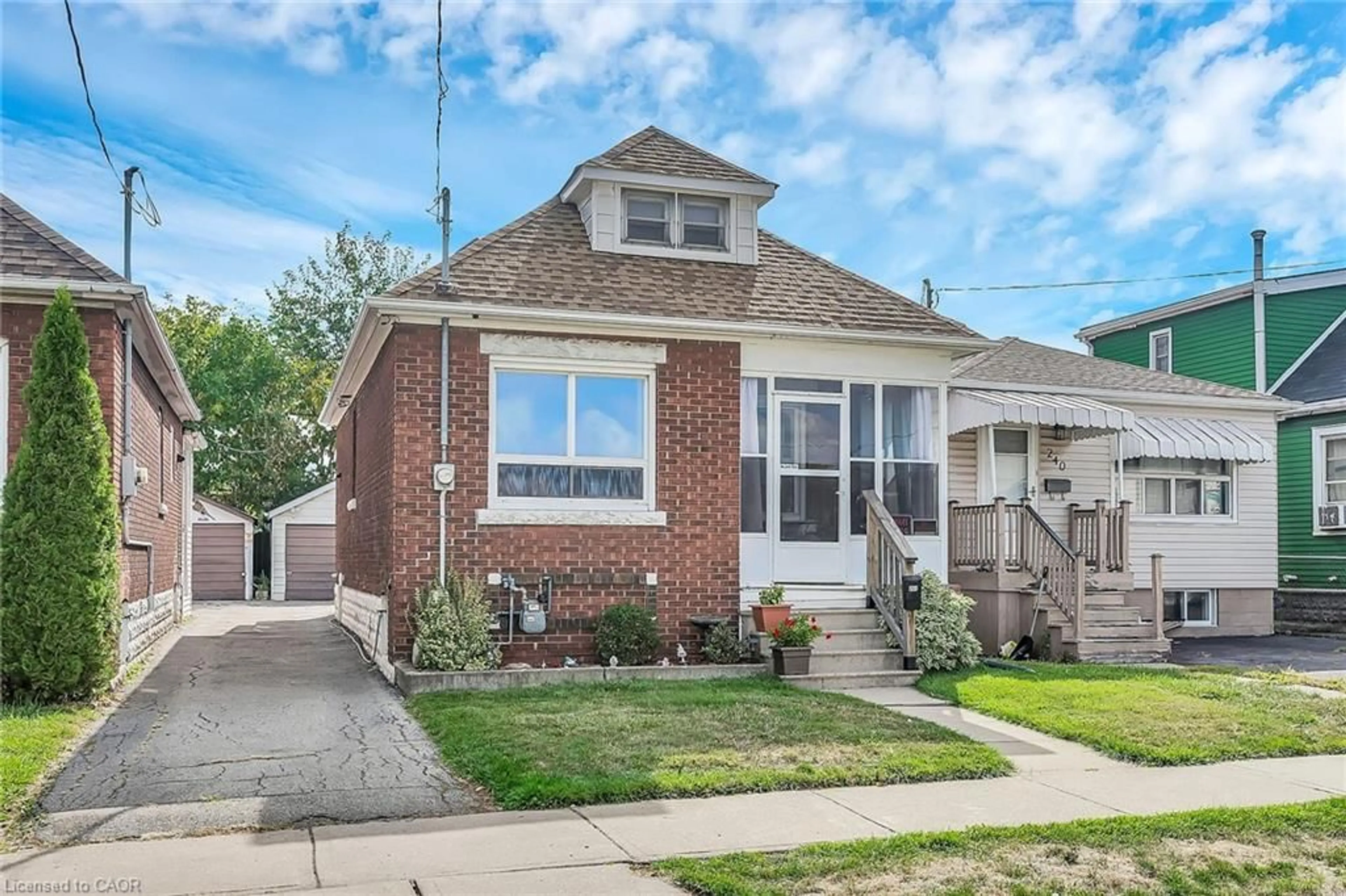 Home with brick exterior material, street for 244 Cope St, Hamilton Ontario L8H 5B5