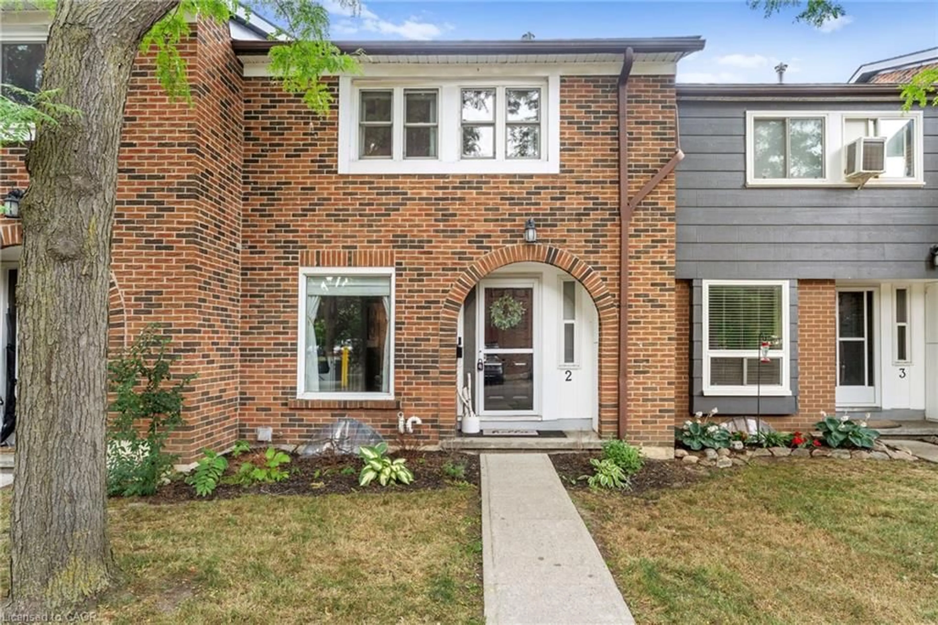 Home with brick exterior material, street for 121 Bagot St #2, Guelph Ontario N1H 5T8