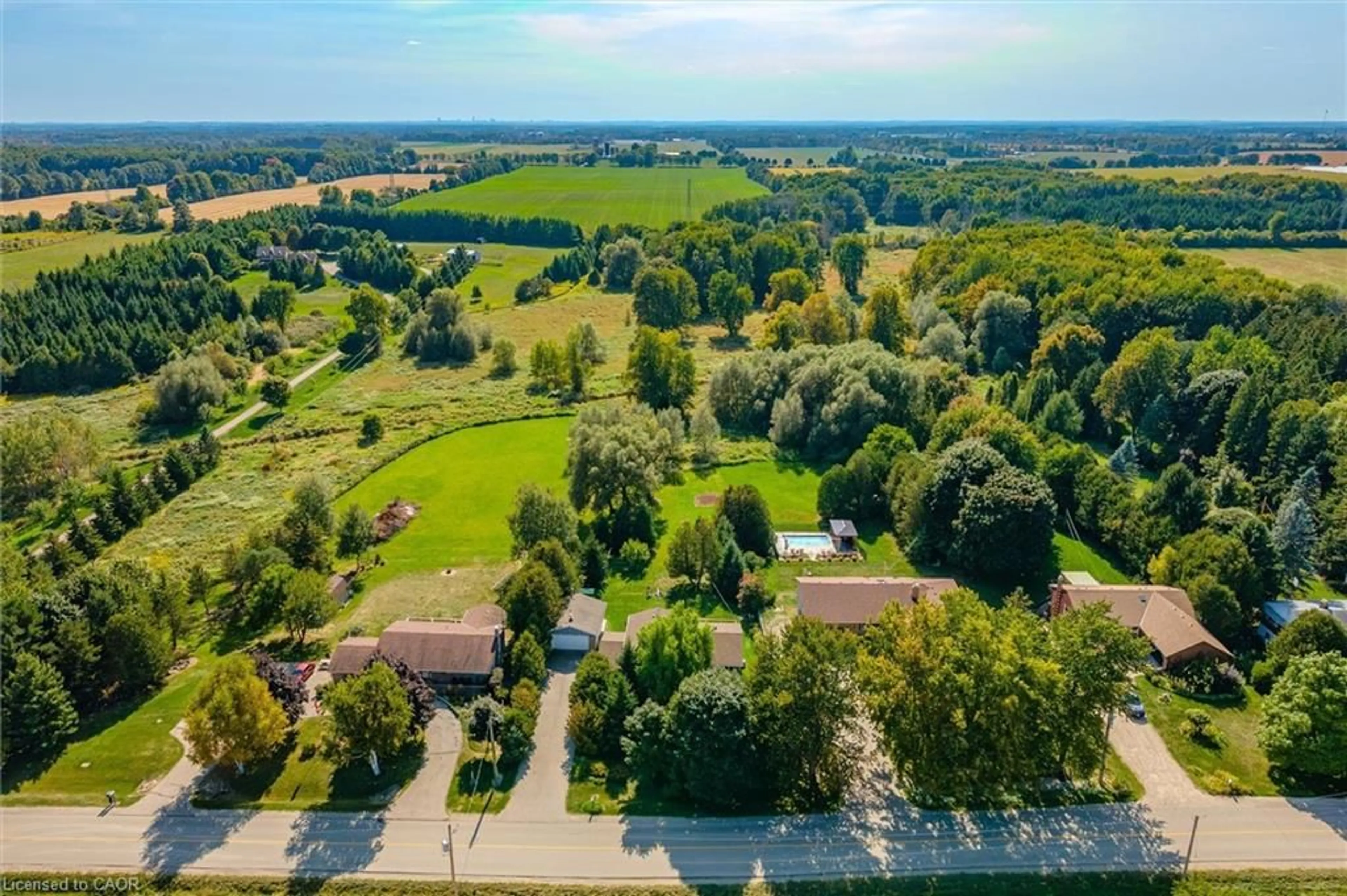 A pic from outside/outdoor area/front of a property/back of a property/a pic from drone, water/lake/river/ocean view for 5900 2nd Line, Ariss Ontario N0B 1B0
