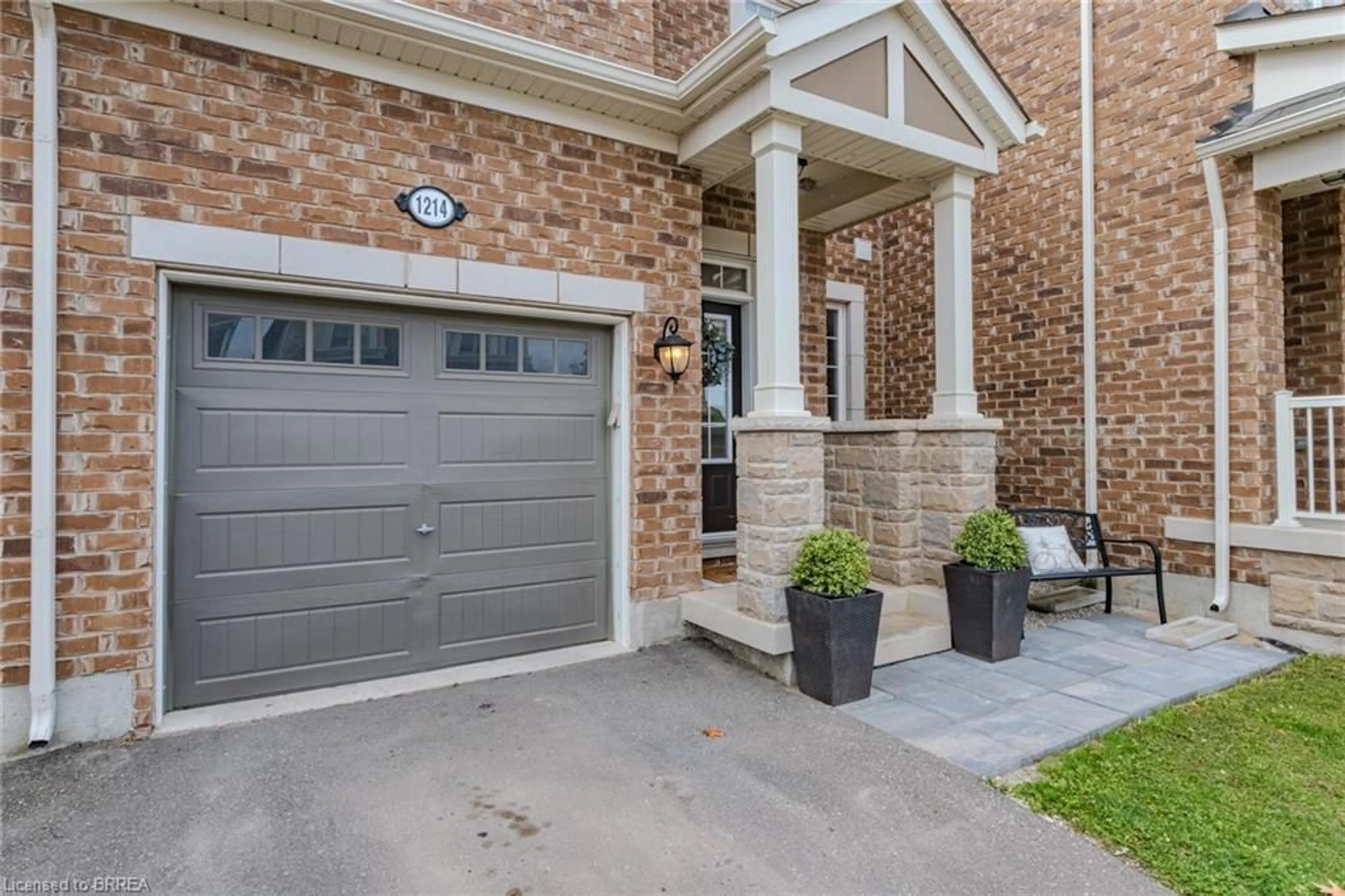 Home with brick exterior material, street for 1214 Rose Way, Milton Ontario L9E 1L9
