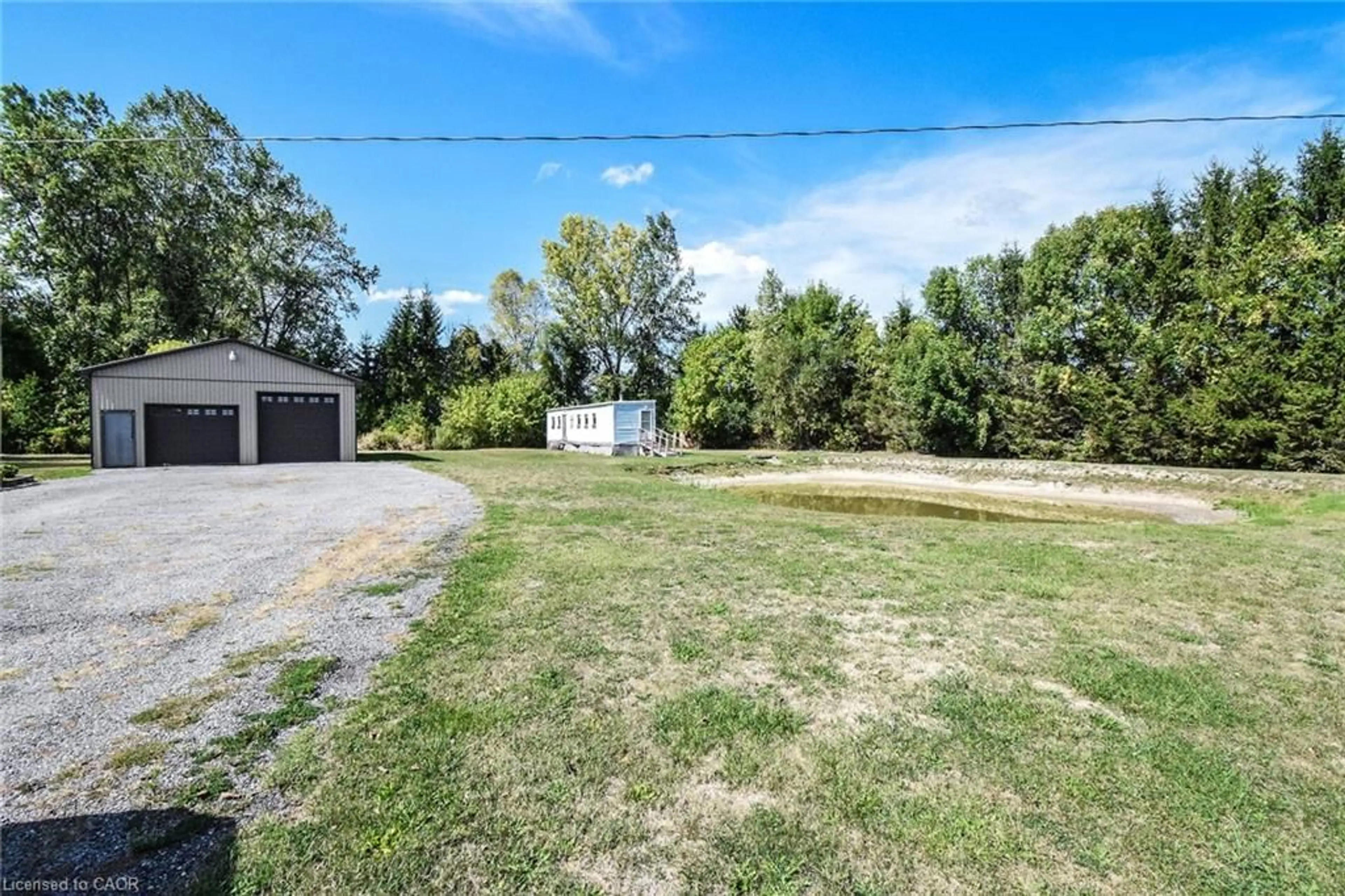A pic from outside/outdoor area/front of a property/back of a property/a pic from drone, unknown for 183 Hines Rd, Dunnville Ontario N1A 2W7