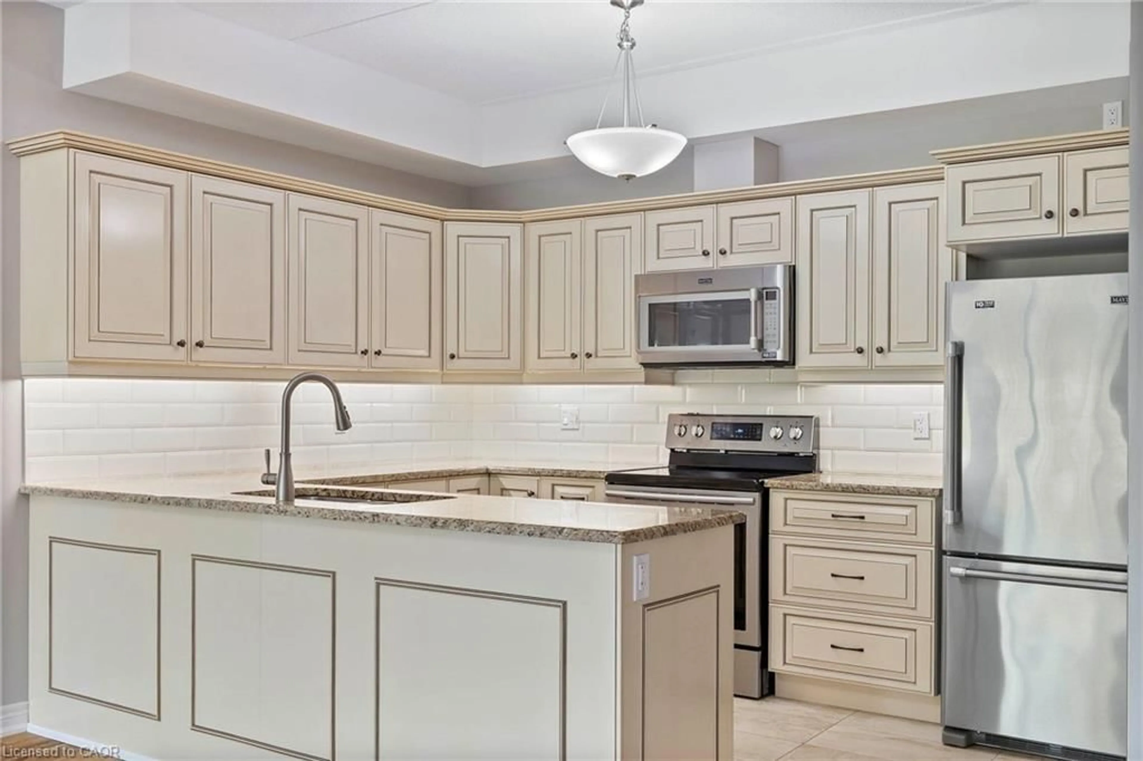 Open concept kitchen, ceramic/tile floor for 4644 Pettit Ave #213, Niagara Falls Ontario L2E 0B4