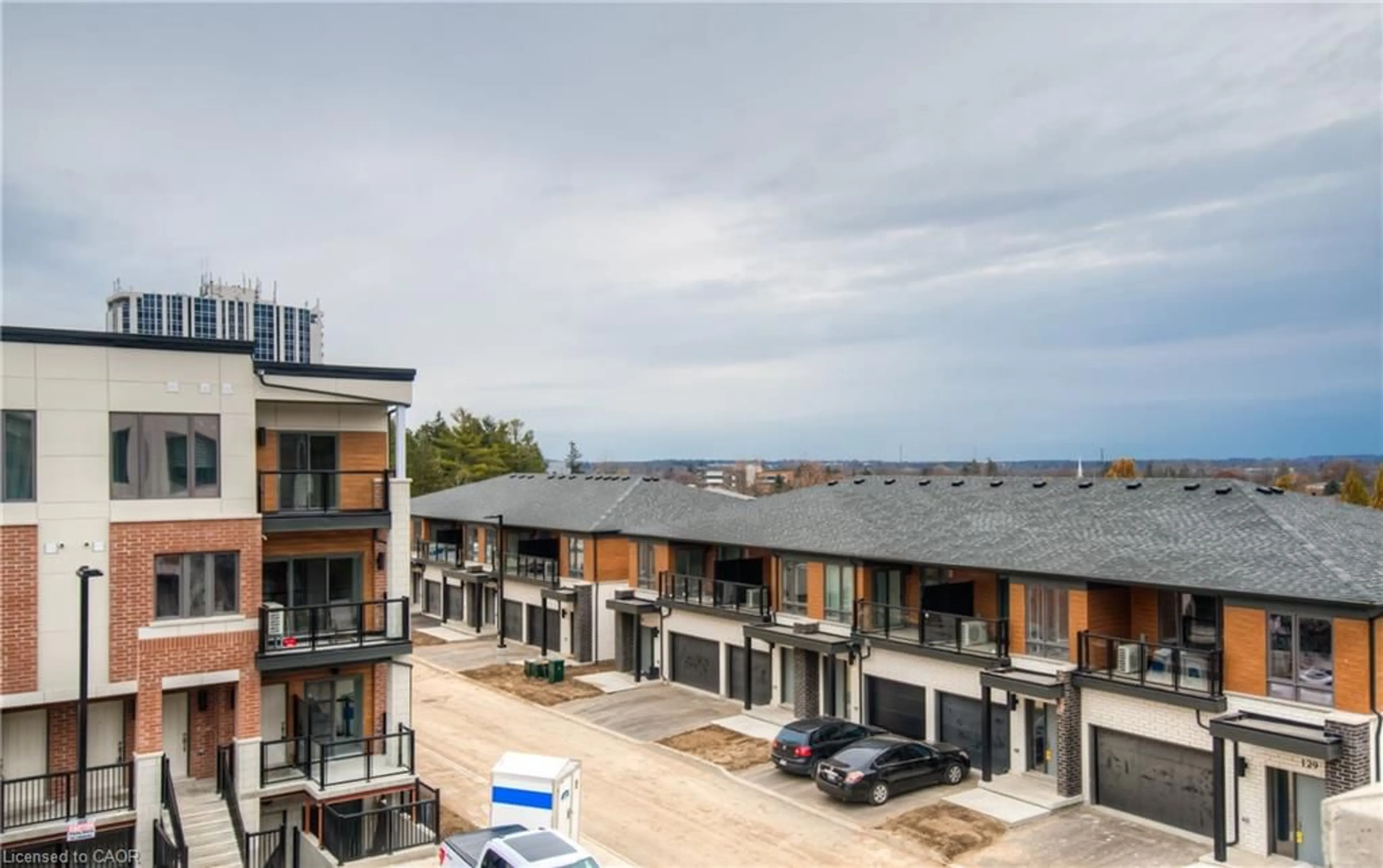A pic from outside/outdoor area/front of a property/back of a property/a pic from drone, city buildings view from balcony for 25 Isherwood Ave #55, Cambridge Ontario N1R 0E2