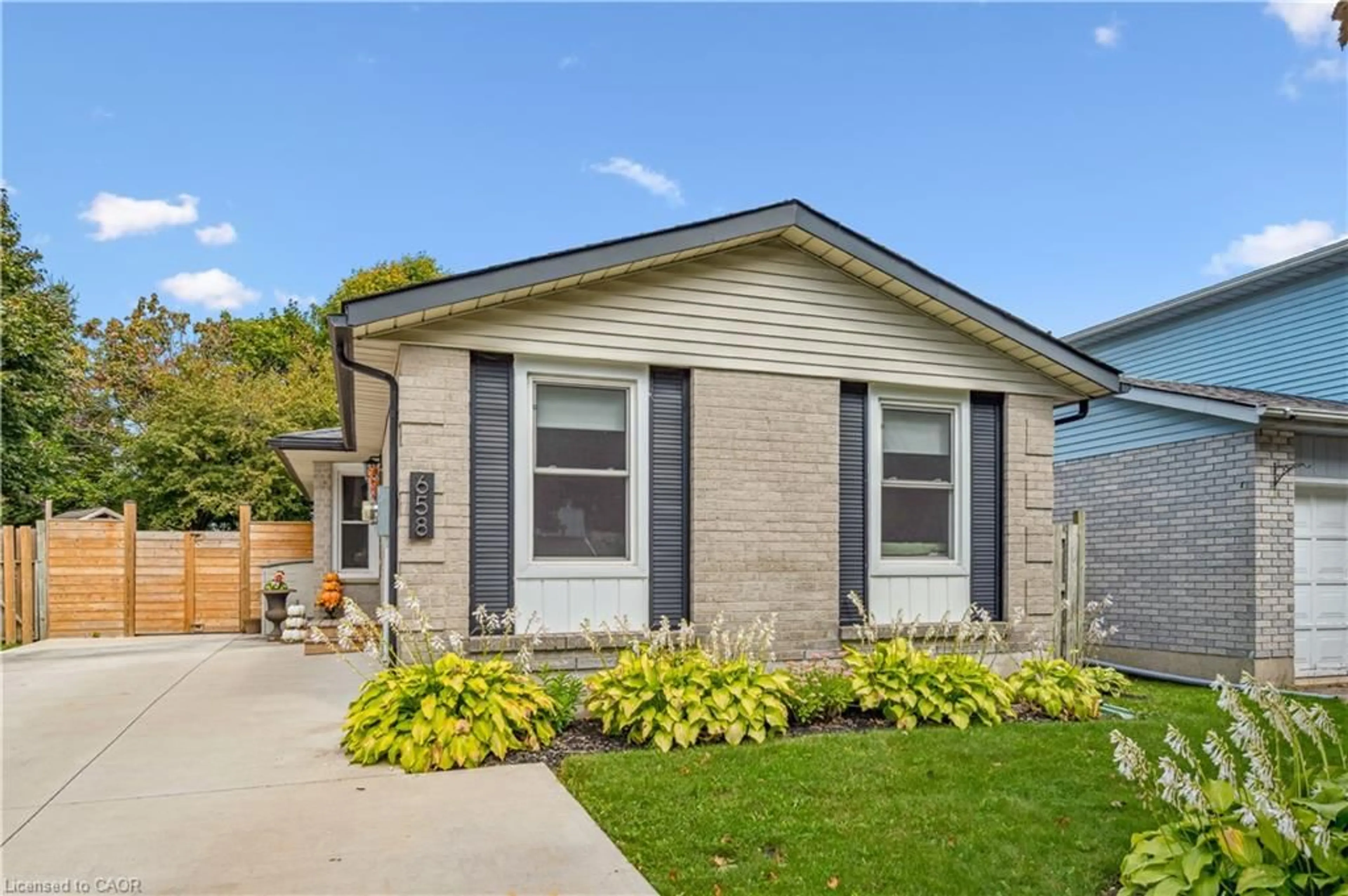 Home with vinyl exterior material, street for 658 Holman Cres, Centre Wellington Ontario N1M 3M2