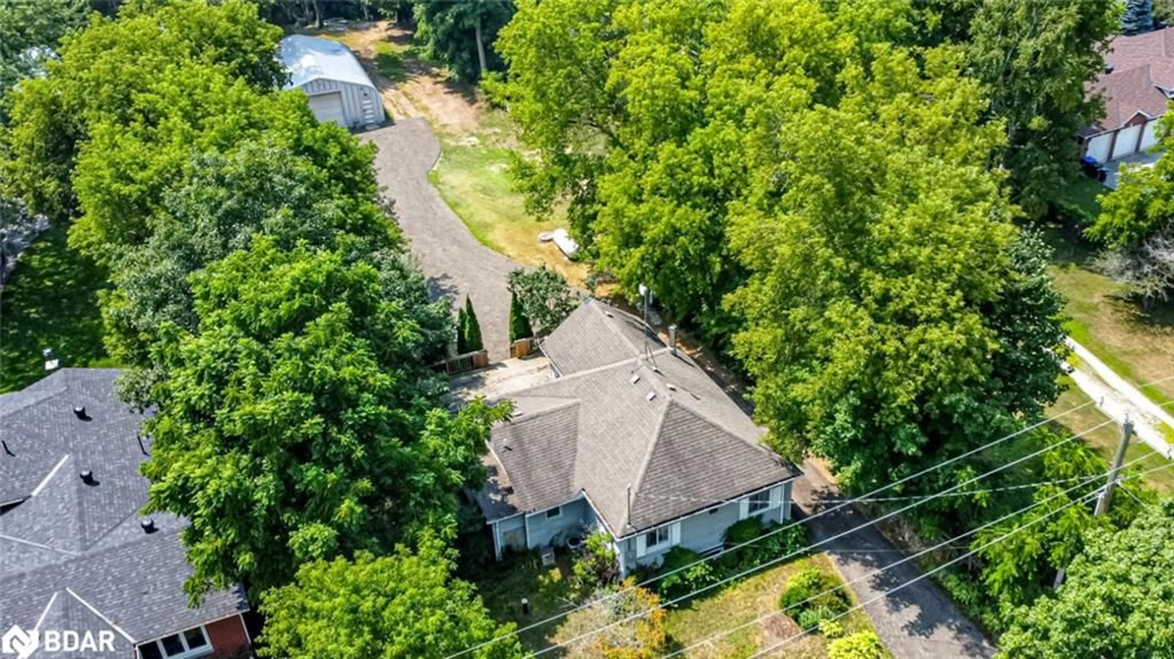A pic from outside/outdoor area/front of a property/back of a property/a pic from drone, street for 9007 Webster Road, Glencairn Ontario L0M 1K0