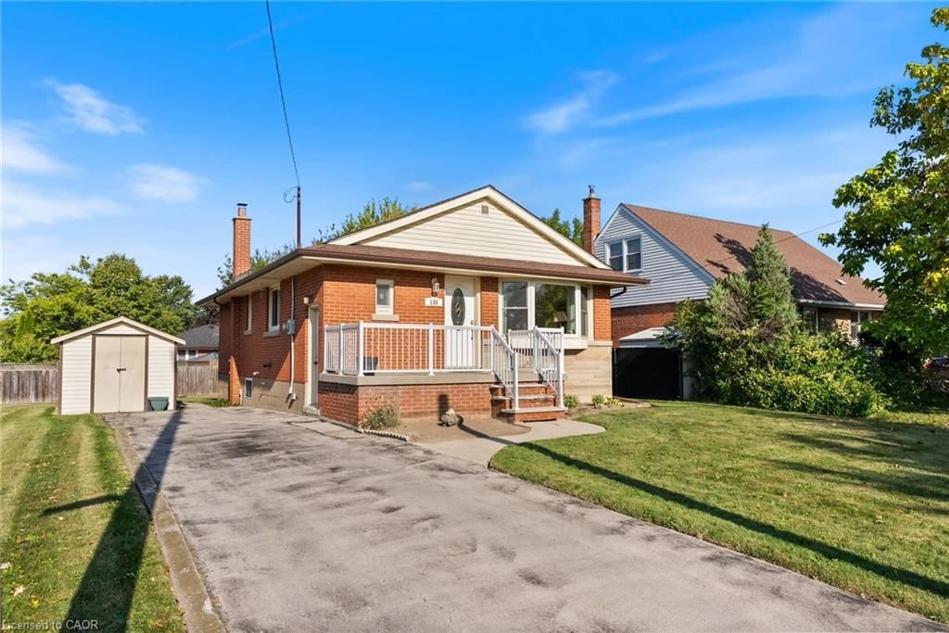 Home with brick exterior material, street for 136 Warren Ave, Hamilton Ontario L9A 3E1