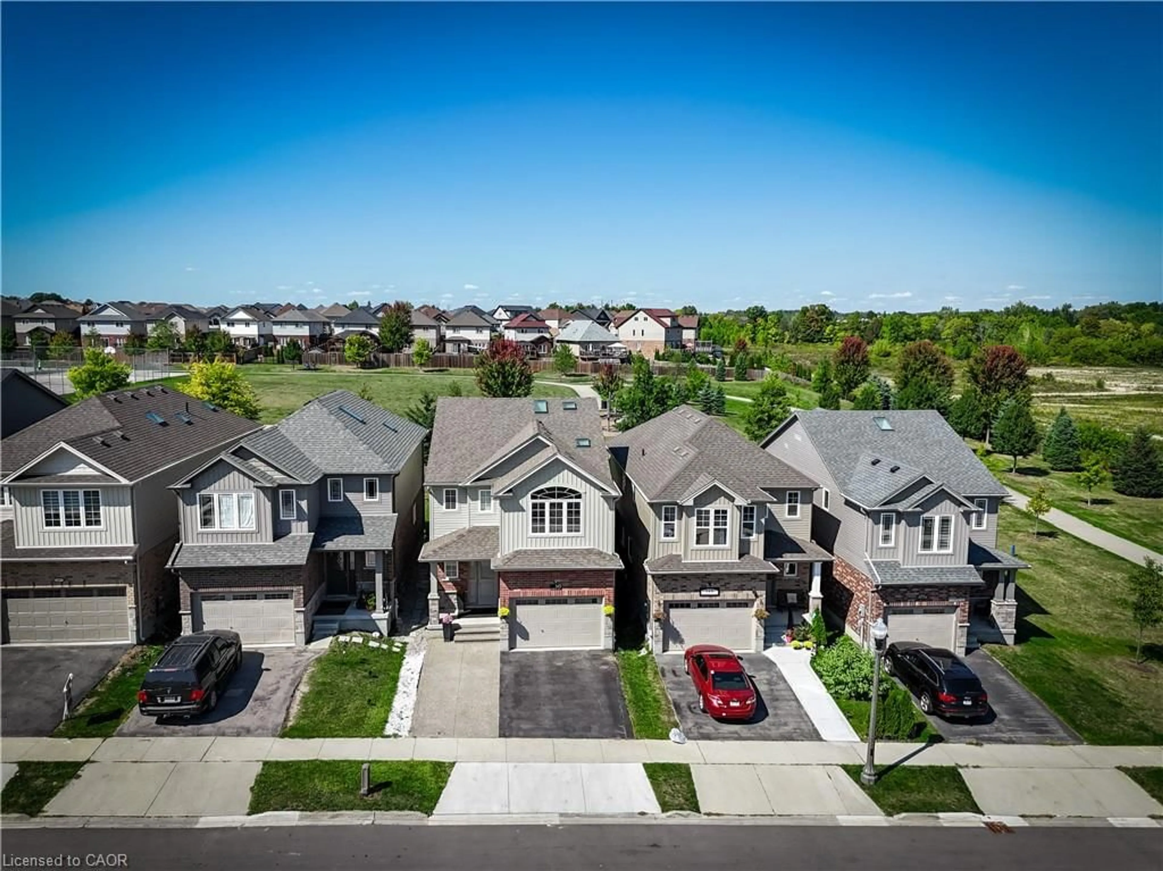 A pic from outside/outdoor area/front of a property/back of a property/a pic from drone, street for 145 Rivertrail Avenue Ave, Kitchener Ontario N2A 0J7