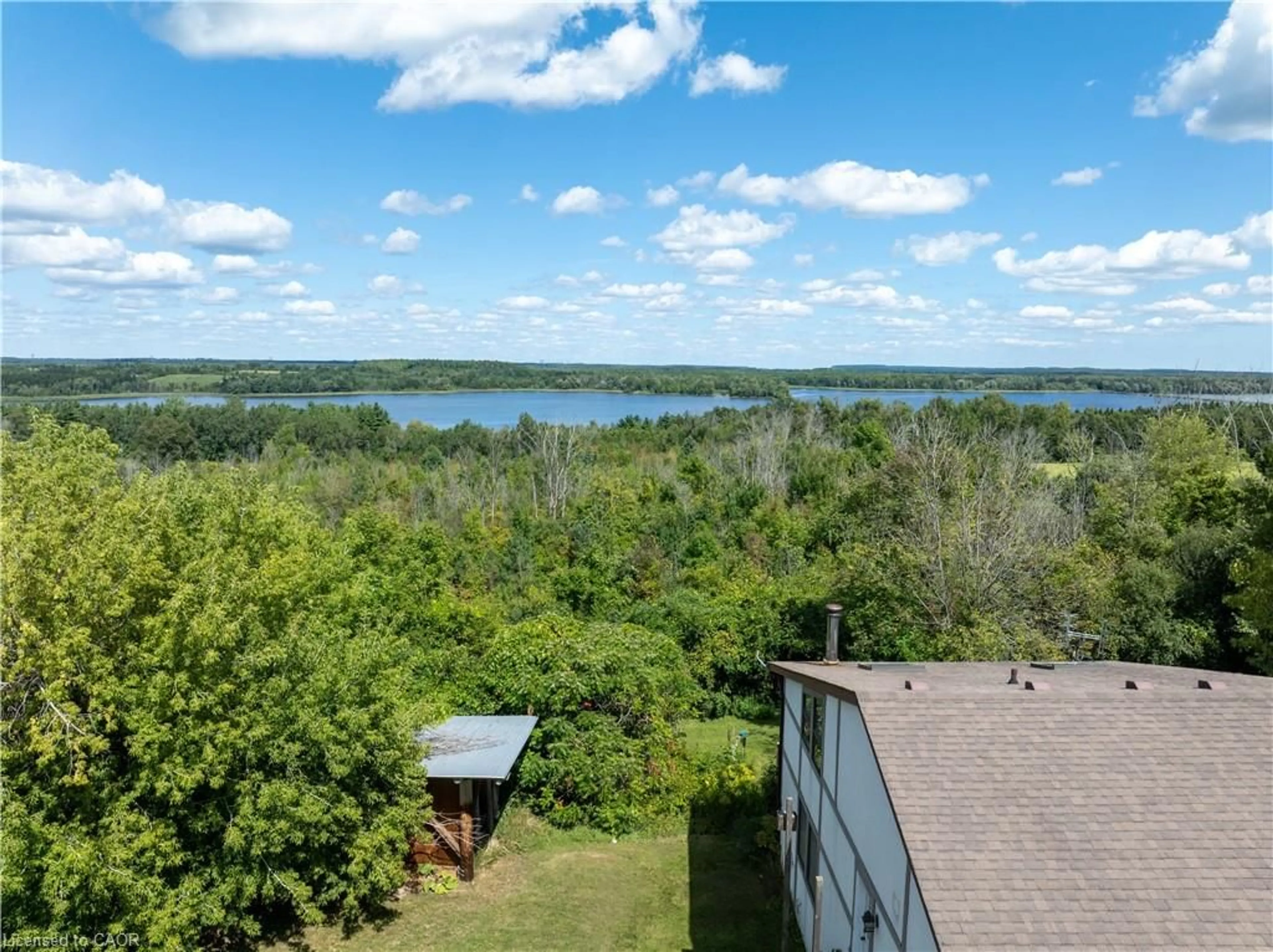 A pic from outside/outdoor area/front of a property/back of a property/a pic from drone, water/lake/river/ocean view for 4053 Watson Rd, Puslinch Ontario N0B 2J0