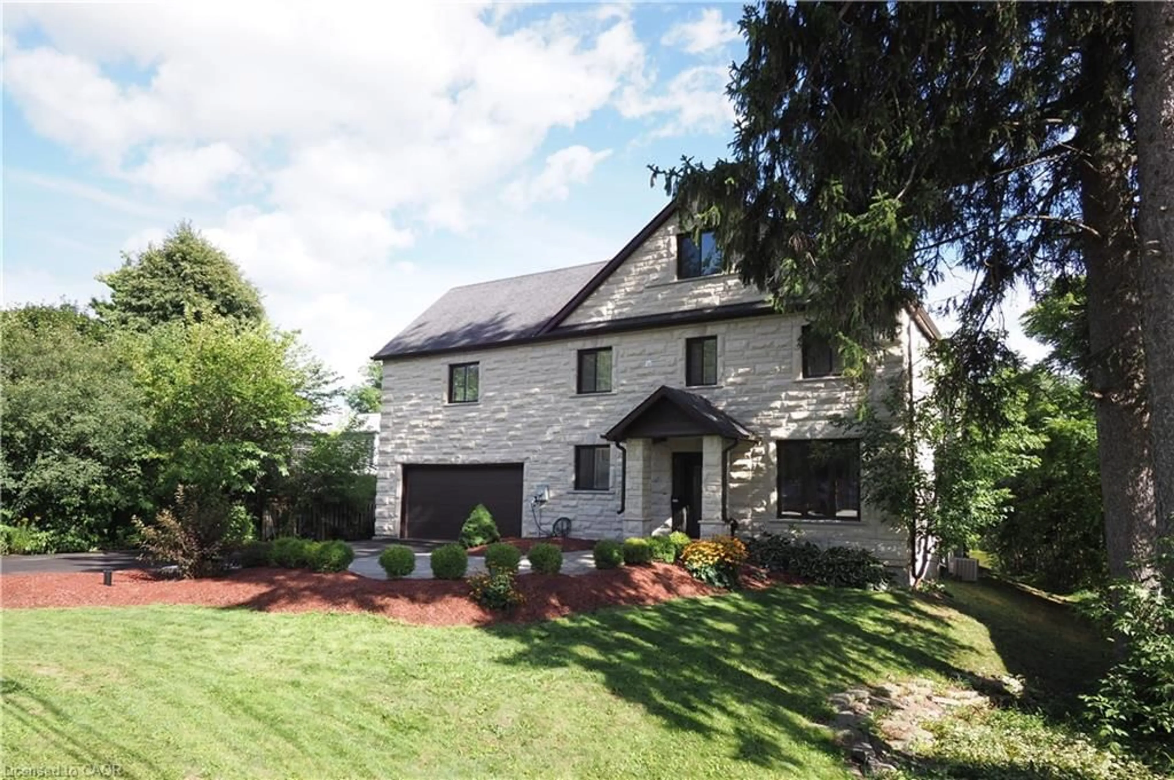 Home with brick exterior material, street for 530 St Andrew St, Fergus Ontario N1M 1R6