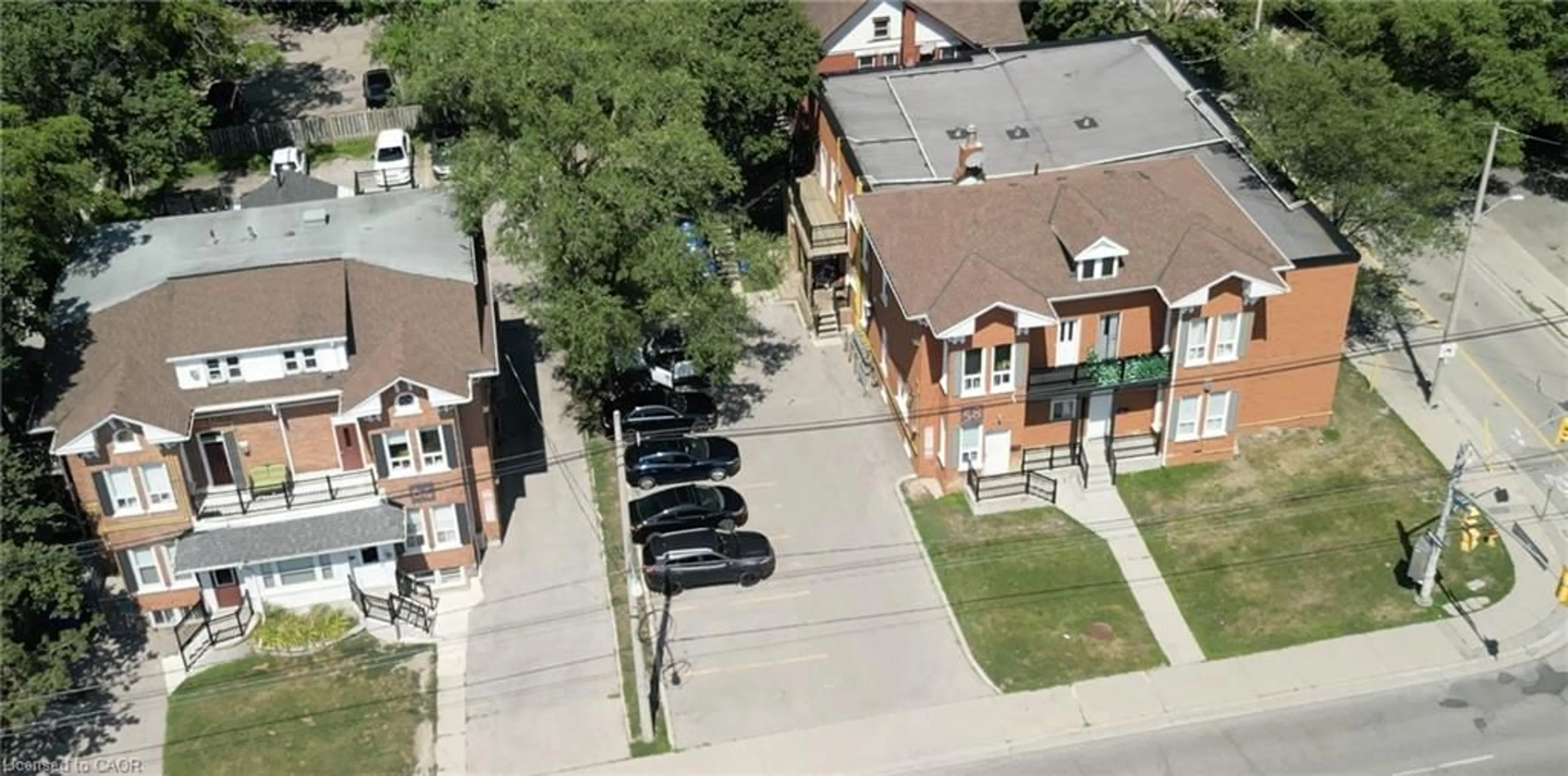 A pic from outside/outdoor area/front of a property/back of a property/a pic from drone, street for 46 College St, Kitchener Ontario N2H 5A1