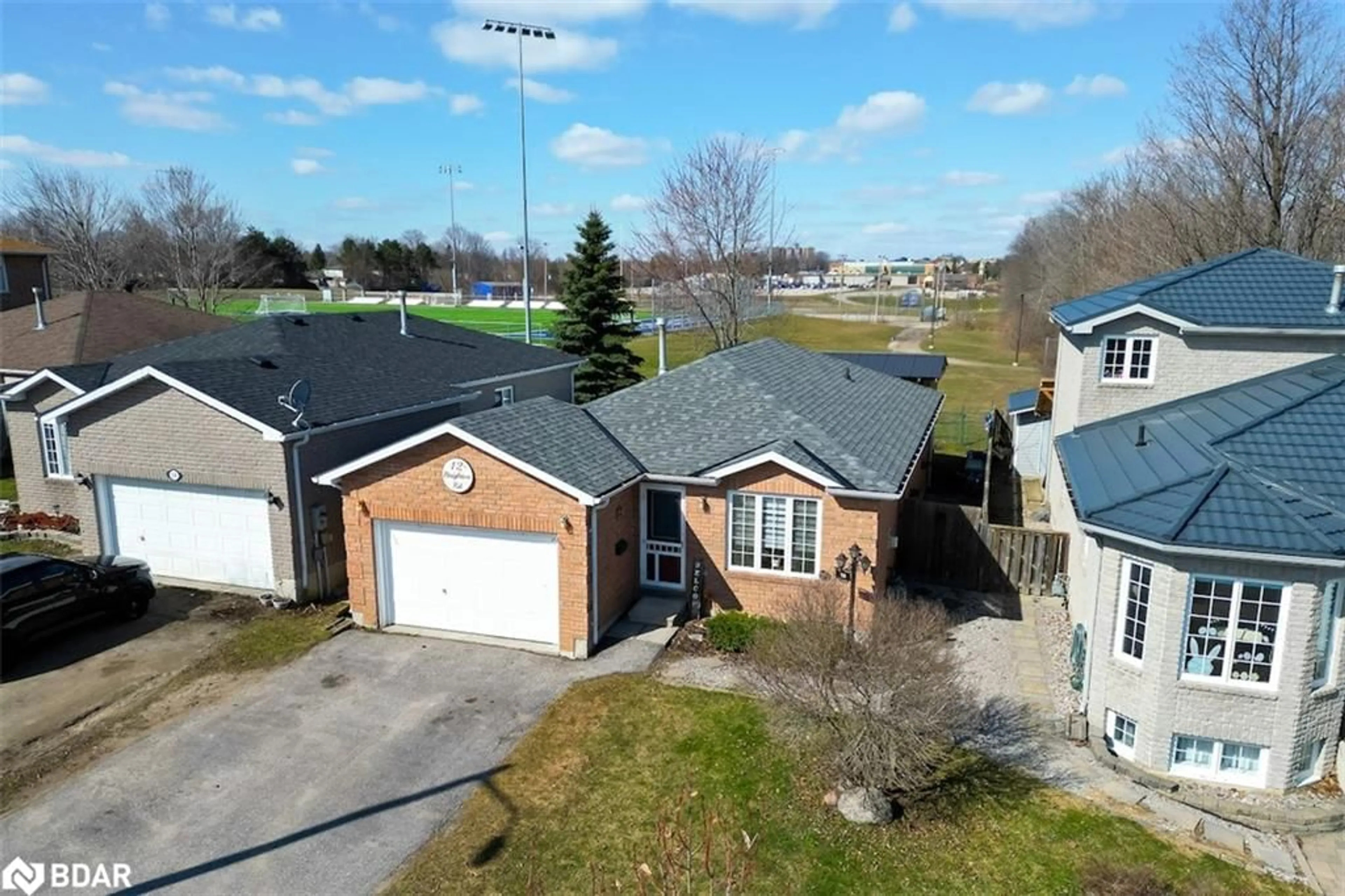A pic from outside/outdoor area/front of a property/back of a property/a pic from drone, street for 12 Brighton Rd, Barrie Ontario L4M 6S5
