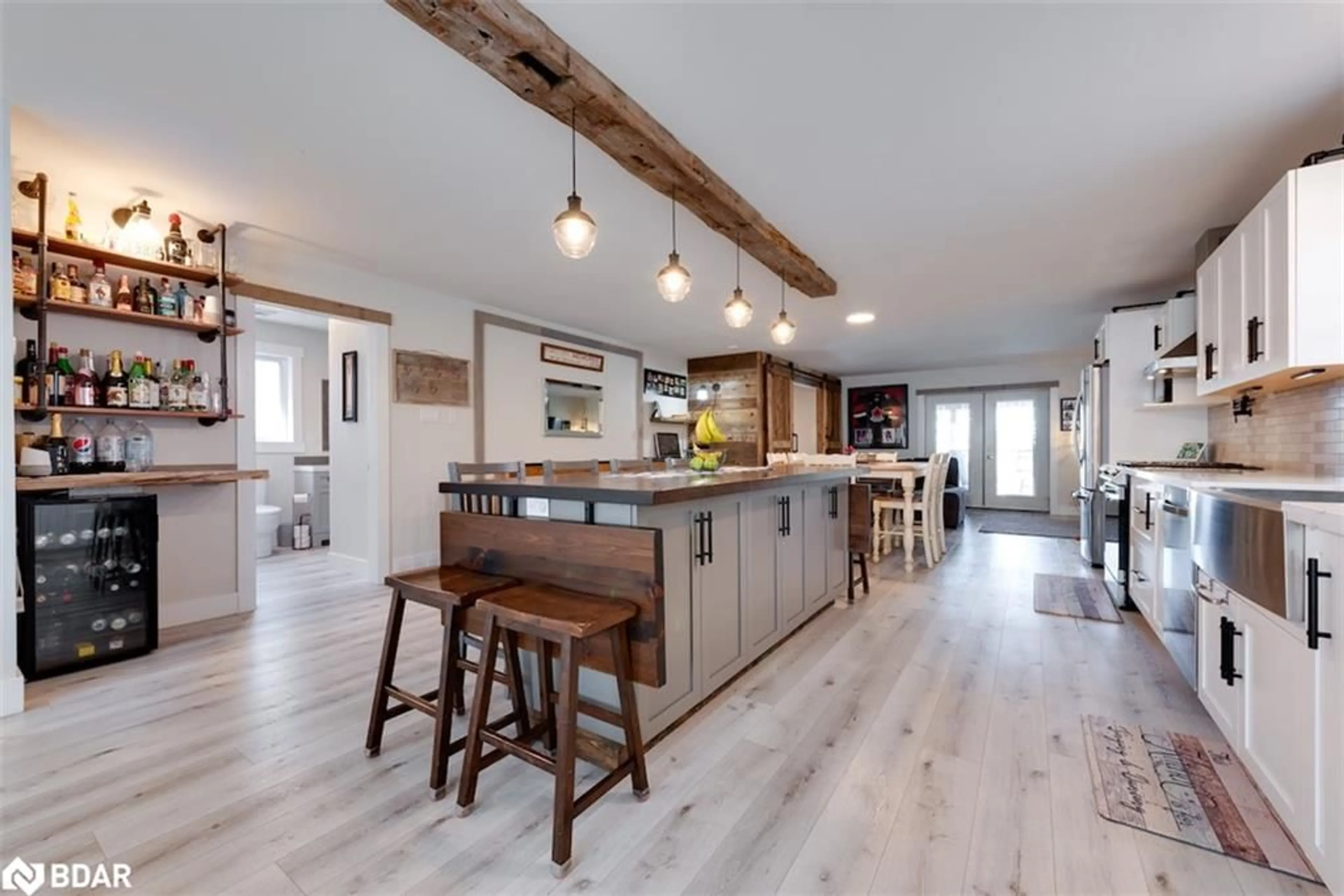 Open concept kitchen, wood/laminate floor for 12 Brighton Rd, Barrie Ontario L4M 6S5