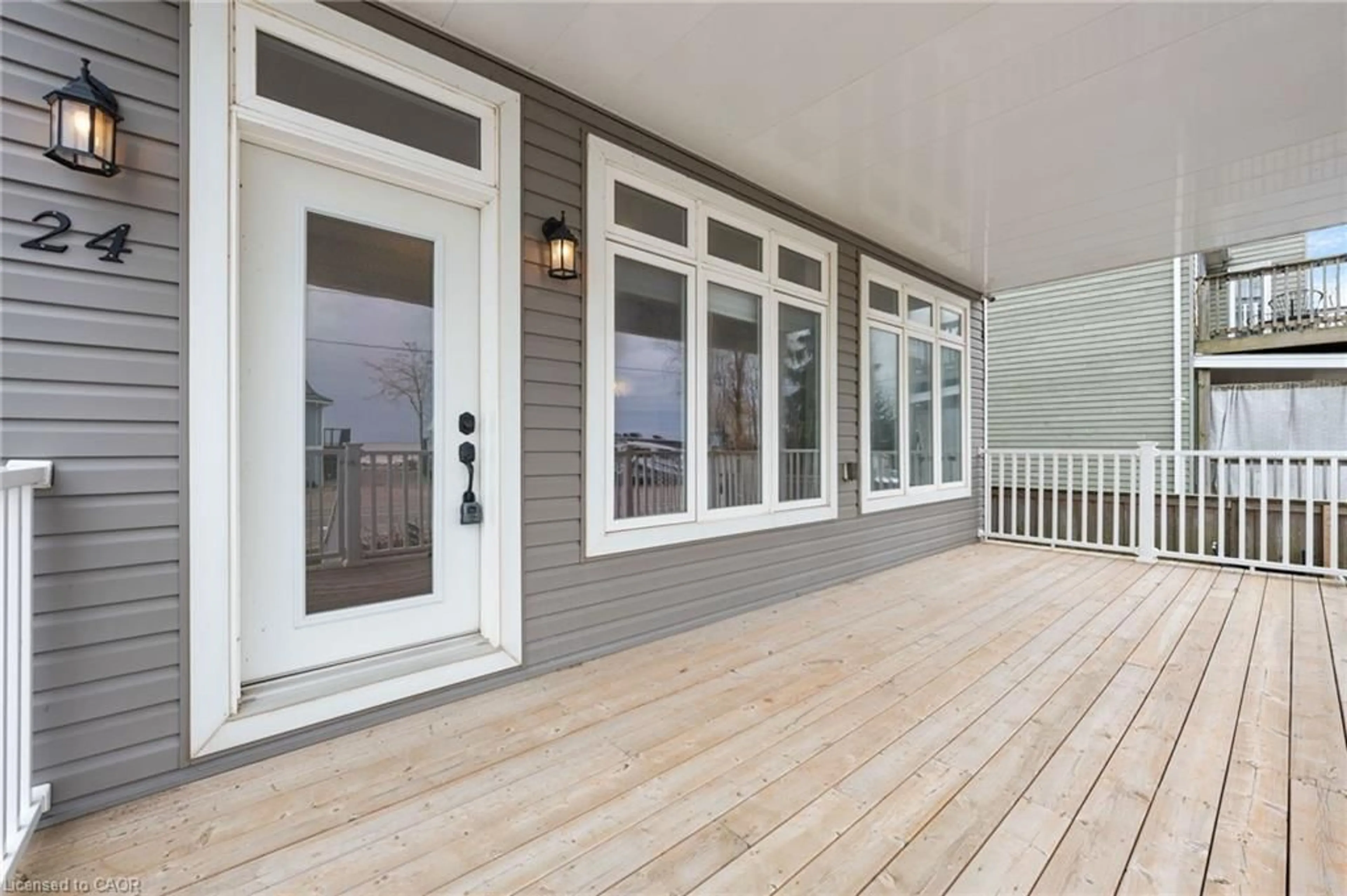 Home with vinyl exterior material, street for 24 Erie Blvd, Long Point Ontario N0E 1M0