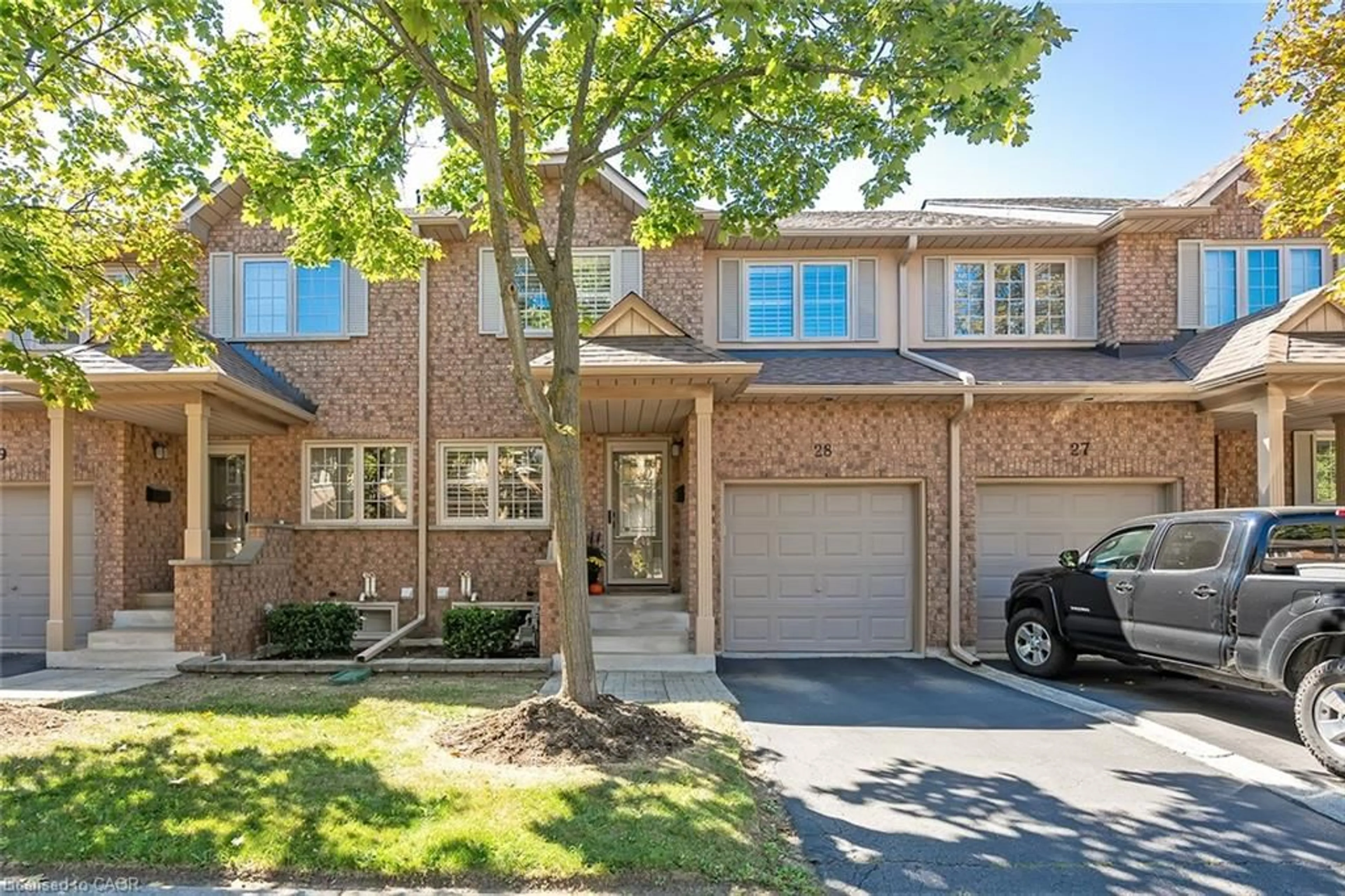 Home with brick exterior material, street for 2880 Headon Forest Dr #28, Burlington Ontario L7M 4H2