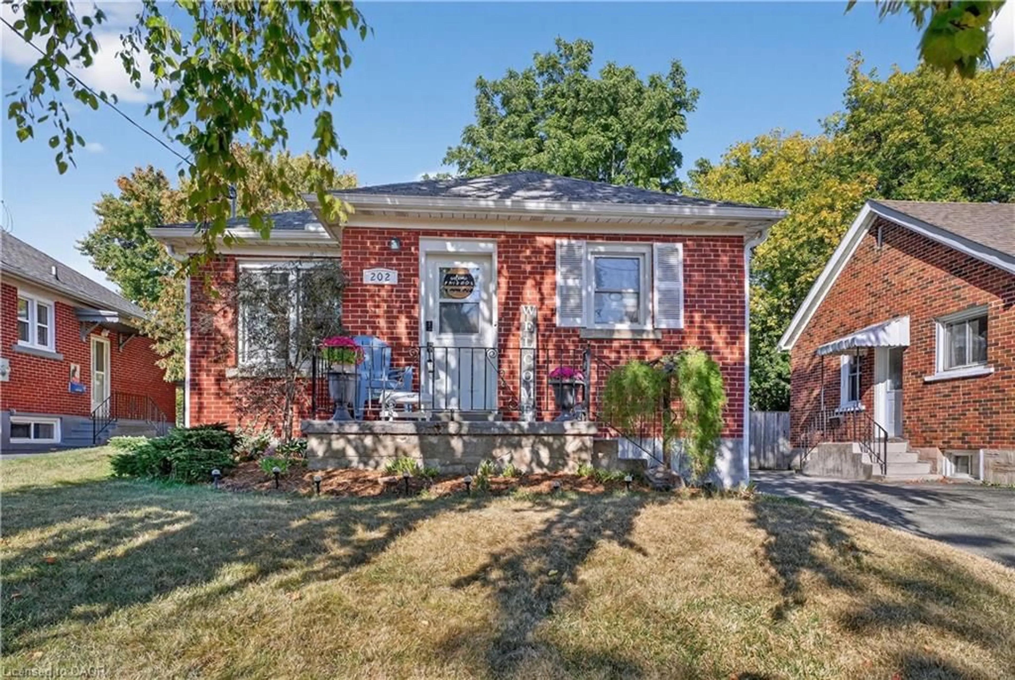 Home with brick exterior material, street for 202 Bedford Rd, Kitchener Ontario N2G 3A6