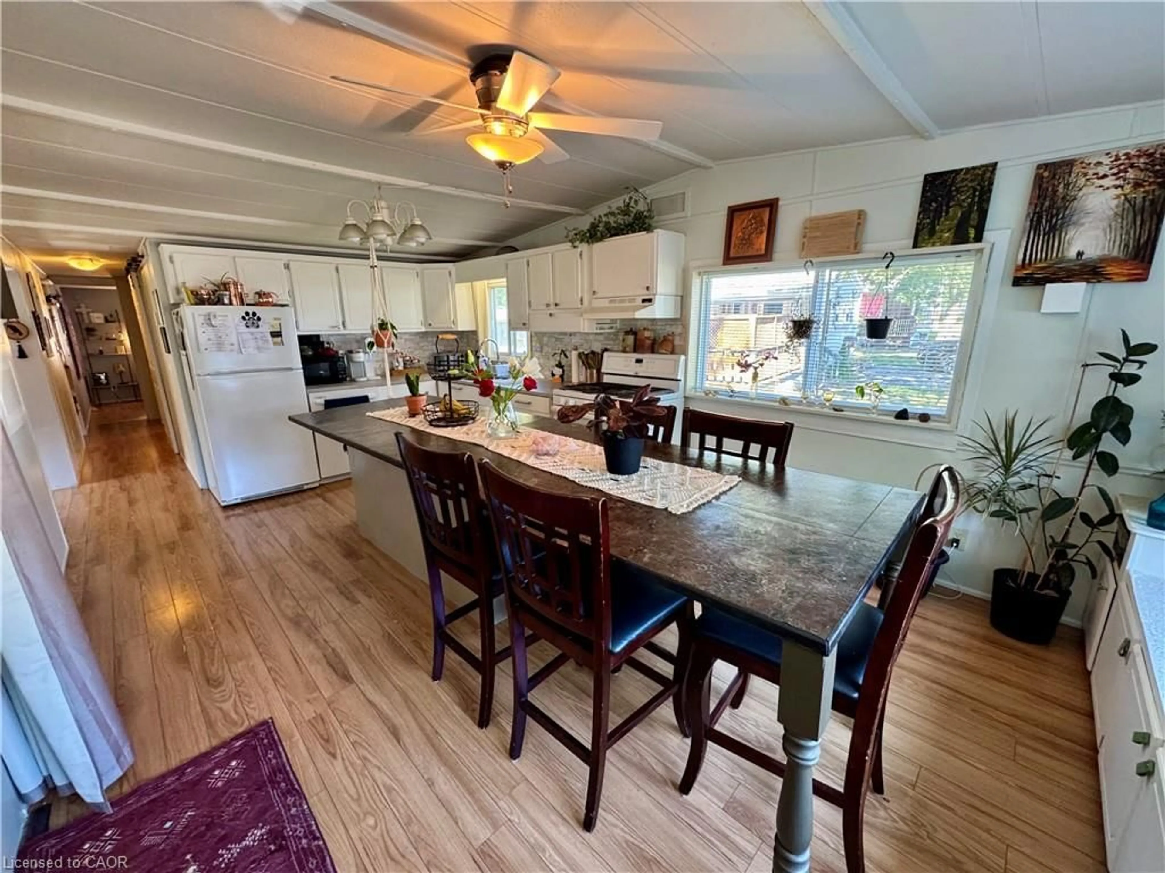 Open concept kitchen, wood/laminate floor for 580 Beaver Creek Rd, Waterloo Ontario N2J 3Z4