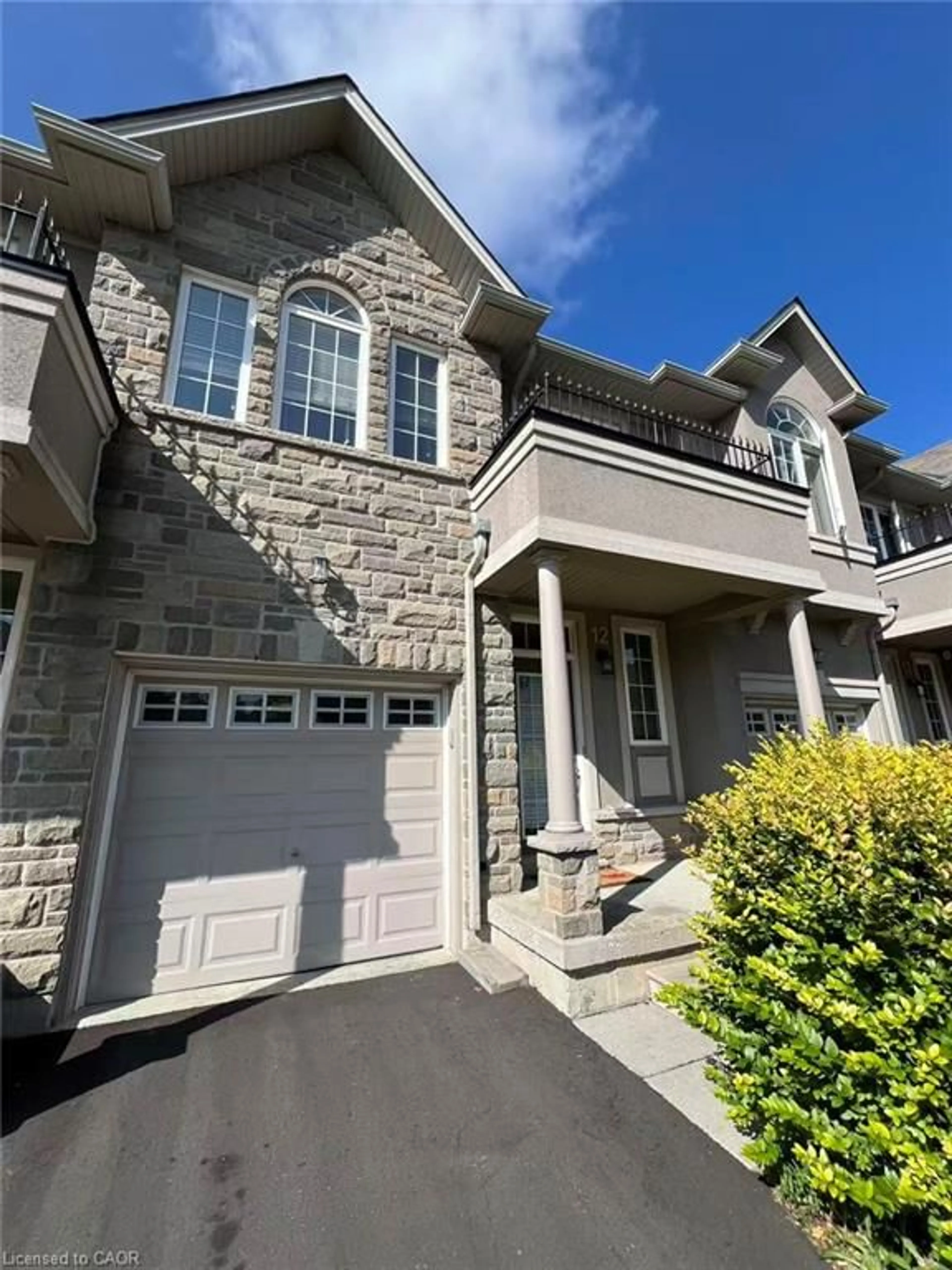 Home with brick exterior material, street for 370 Stonehenge Dr #12, Ancaster Ontario L9K 0H9