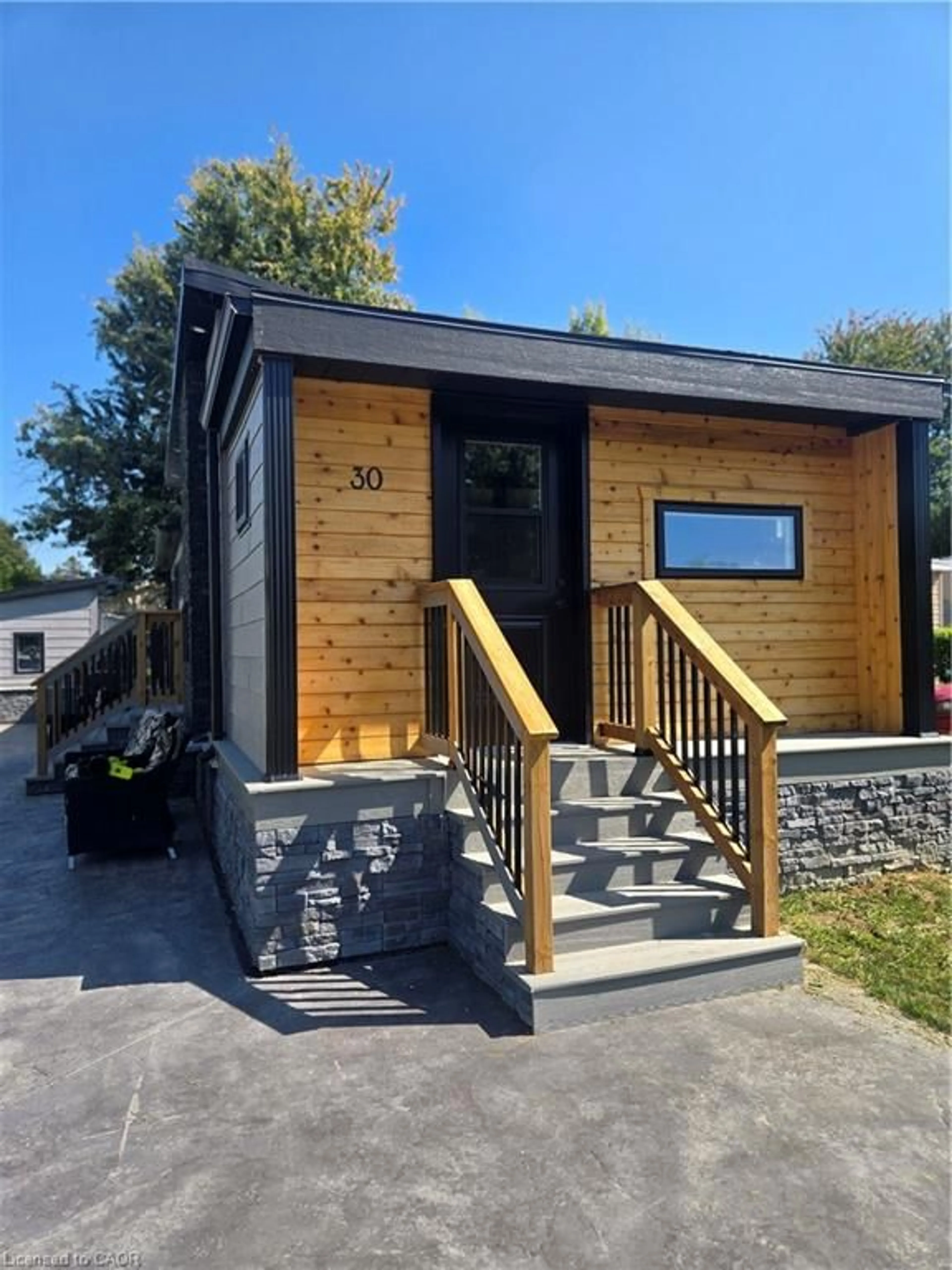 Home with vinyl exterior material, street for 22220 Charing Cross Rd #30, Chatham Ontario N7M 5V8