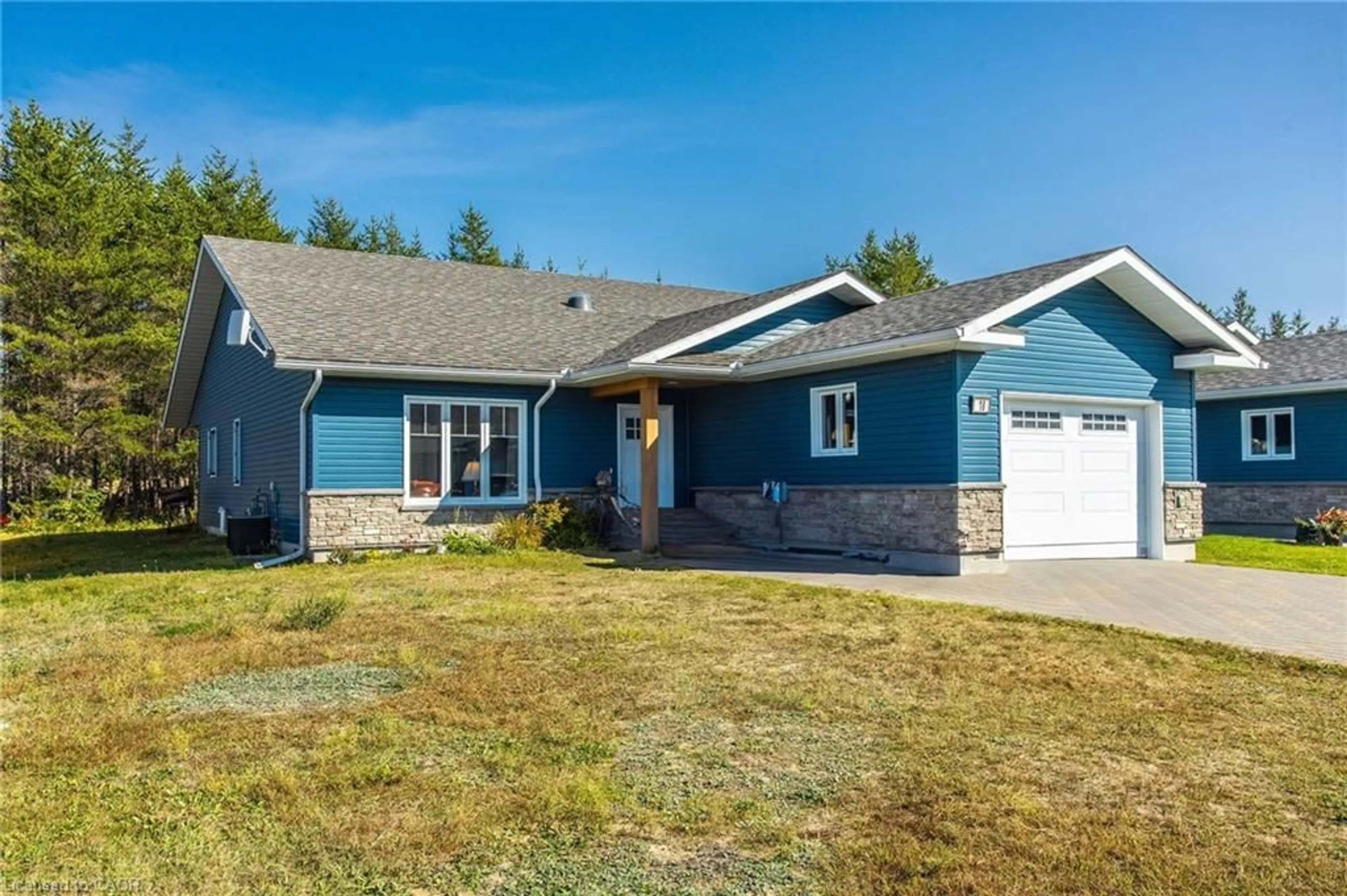 Home with vinyl exterior material, street for 18 Yusko Cres, Espanola Ontario P5E 0A2
