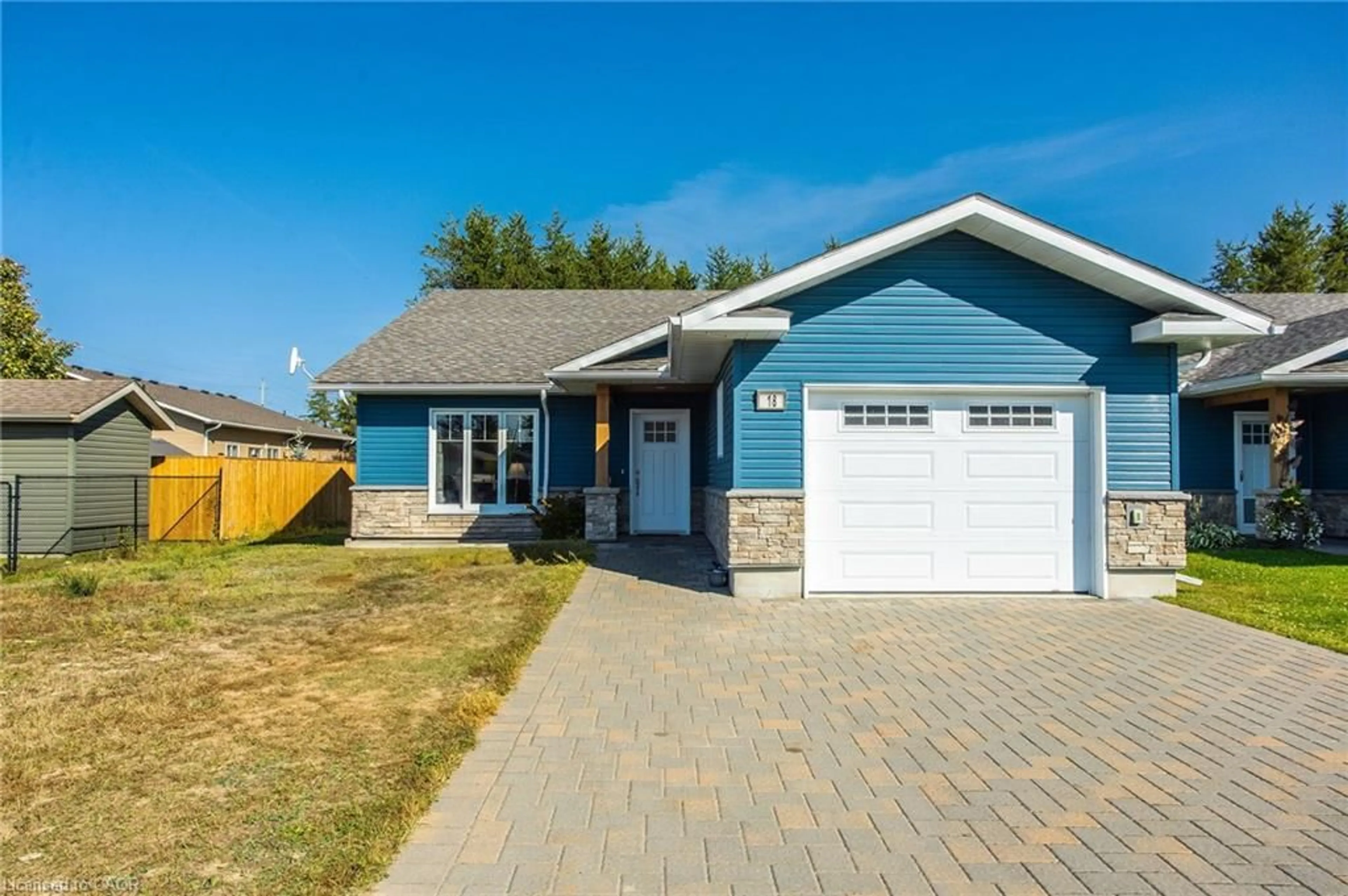 Home with vinyl exterior material, street for 18 Yusko Cres, Espanola Ontario P5E 0A2