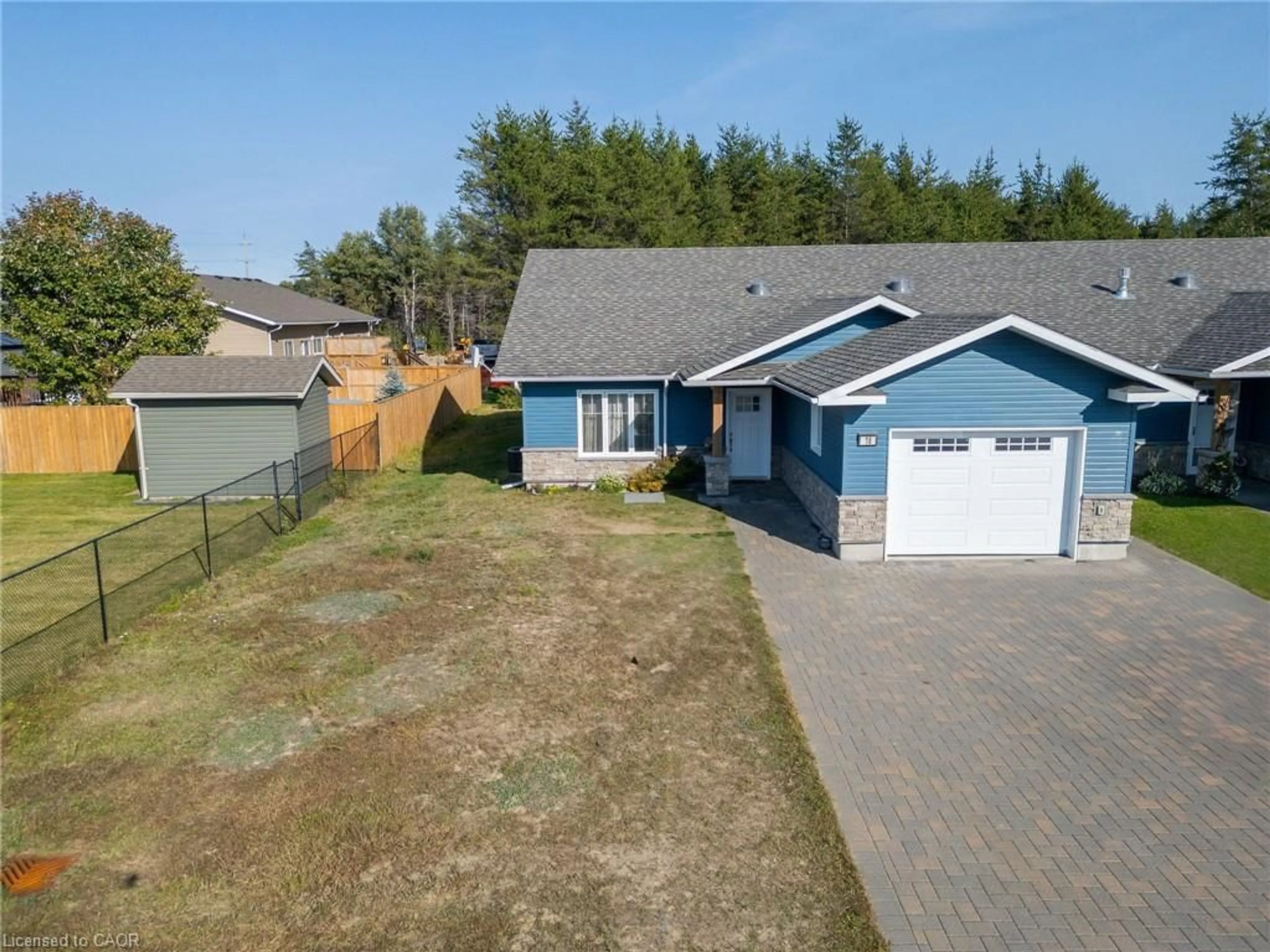 A pic from outside/outdoor area/front of a property/back of a property/a pic from drone, street for 18 Yusko Cres, Espanola Ontario P5E 0A2