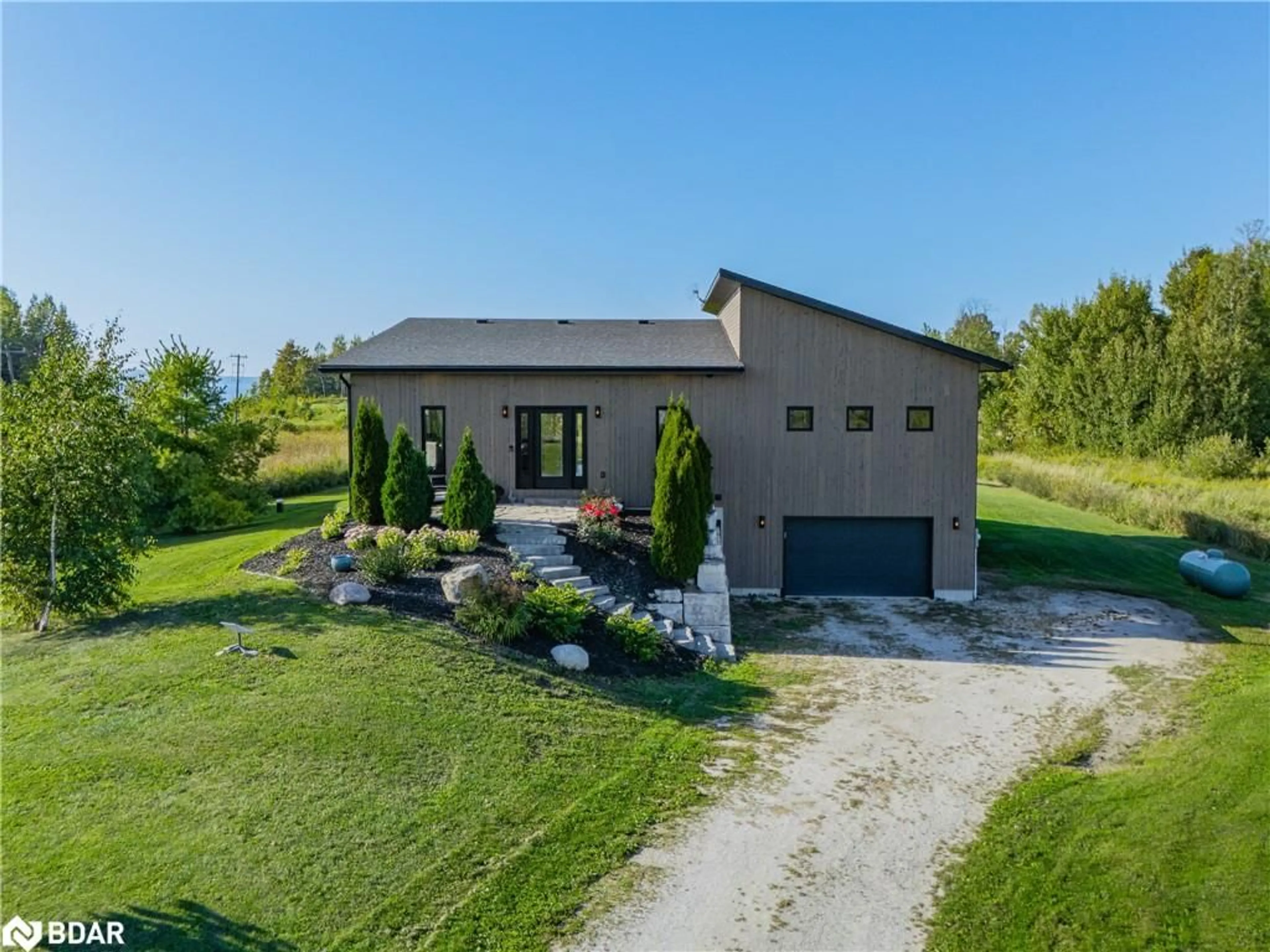 A pic from outside/outdoor area/front of a property/back of a property/a pic from drone, street for 103 Ugovsek Cres, Annan Ontario N0H 1B0