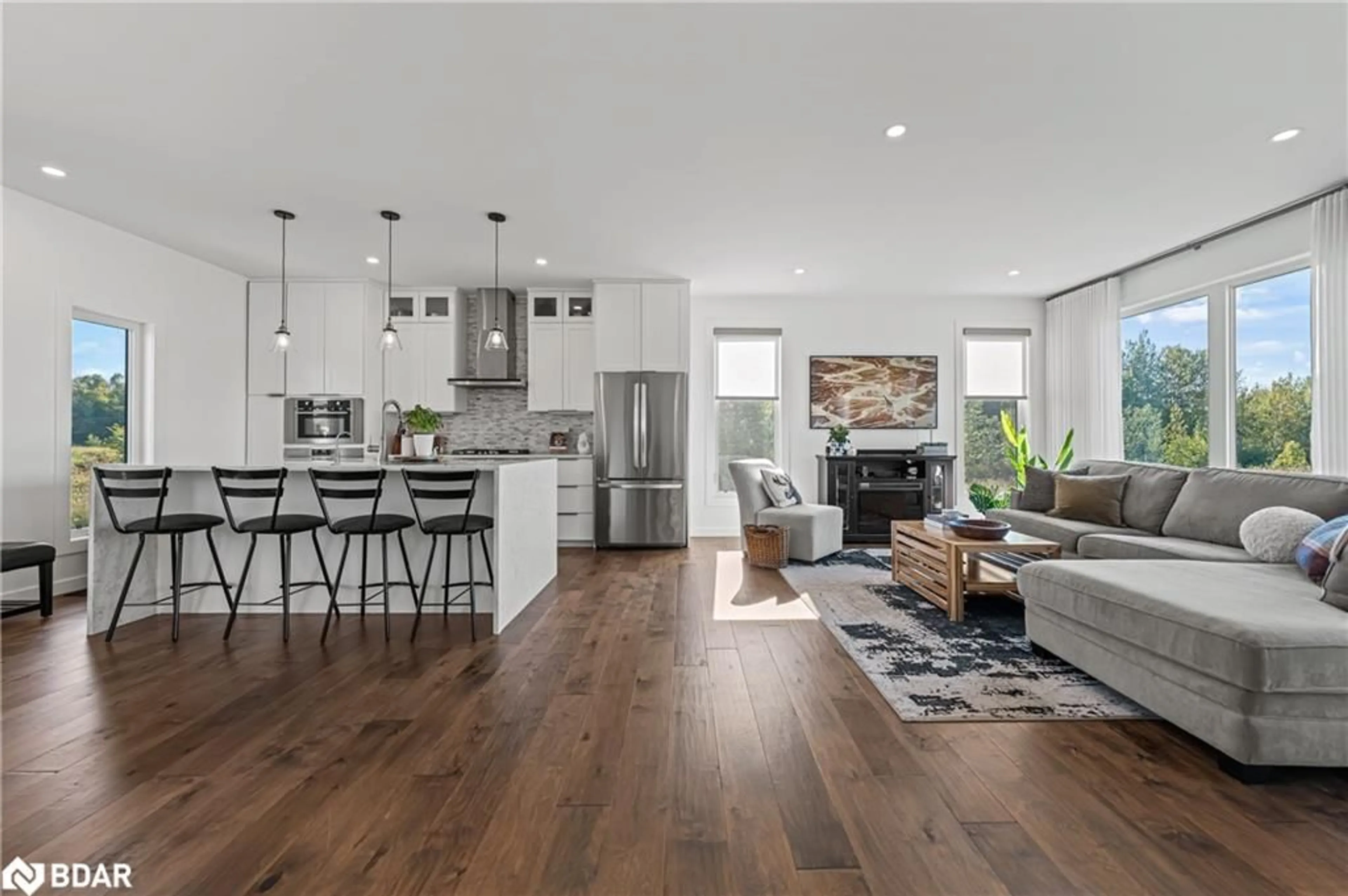 Open concept kitchen, wood/laminate floor for 103 Ugovsek Cres, Annan Ontario N0H 1B0