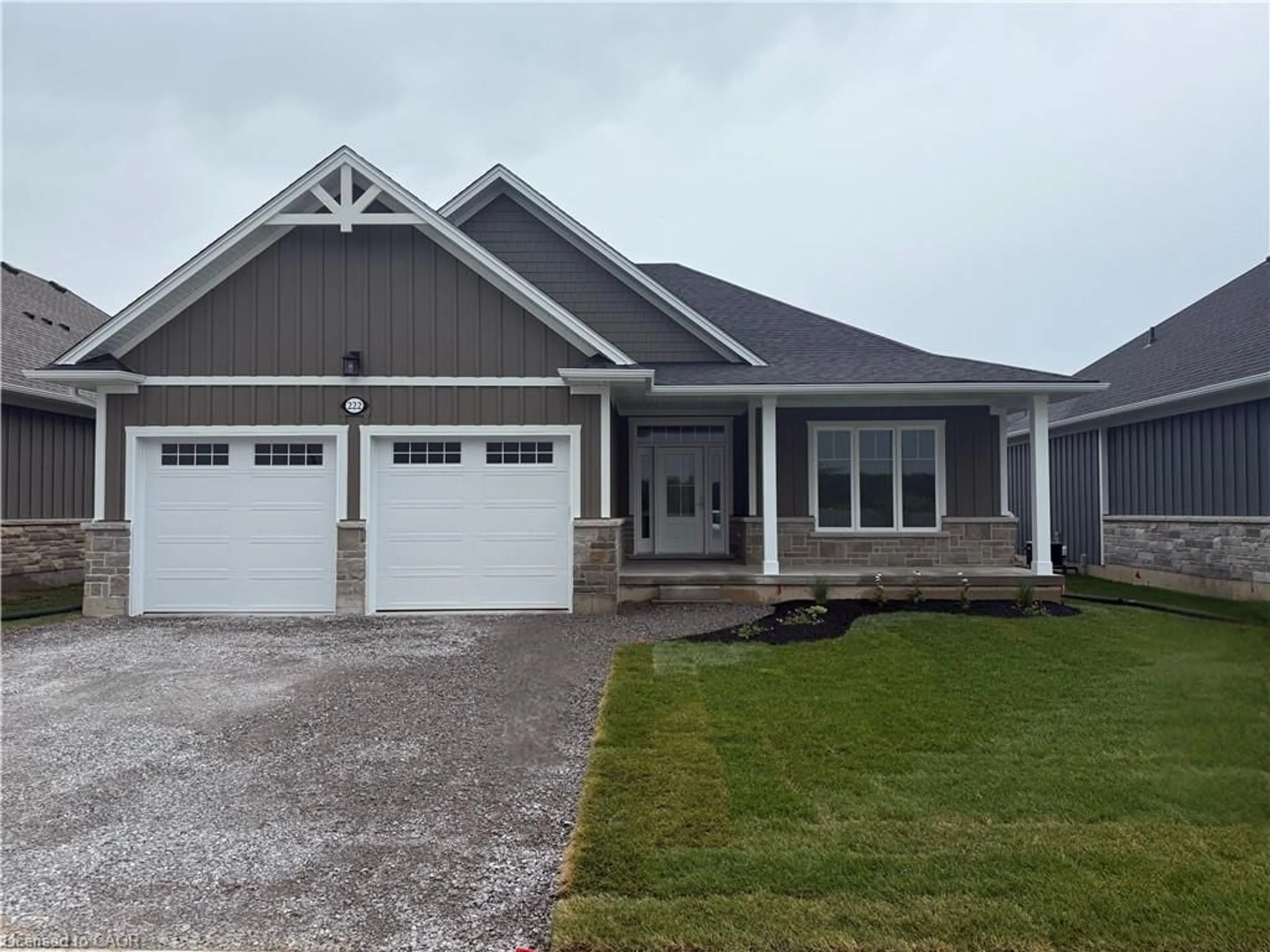 Home with vinyl exterior material, street for 222 Schooner Dr, Port Dover Ontario N0A 1N3