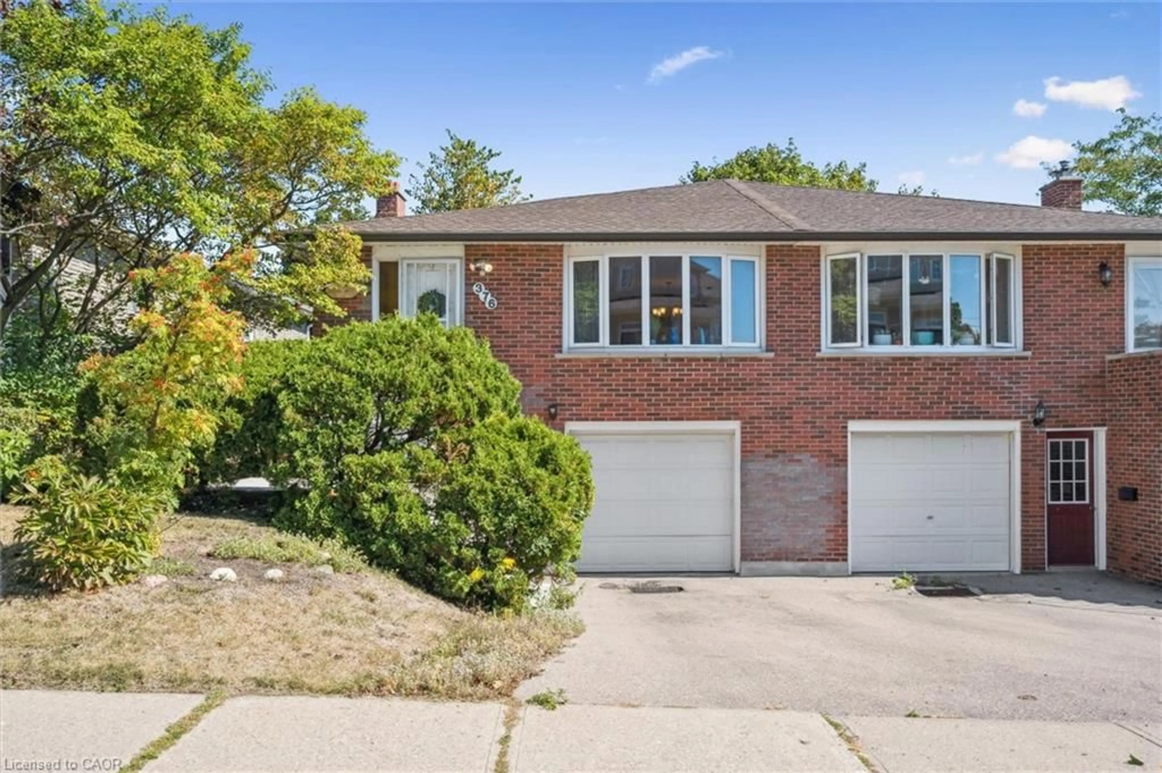 Home with brick exterior material, street for 376 Westwood Dr, Kitchener Ontario N2M 2L6