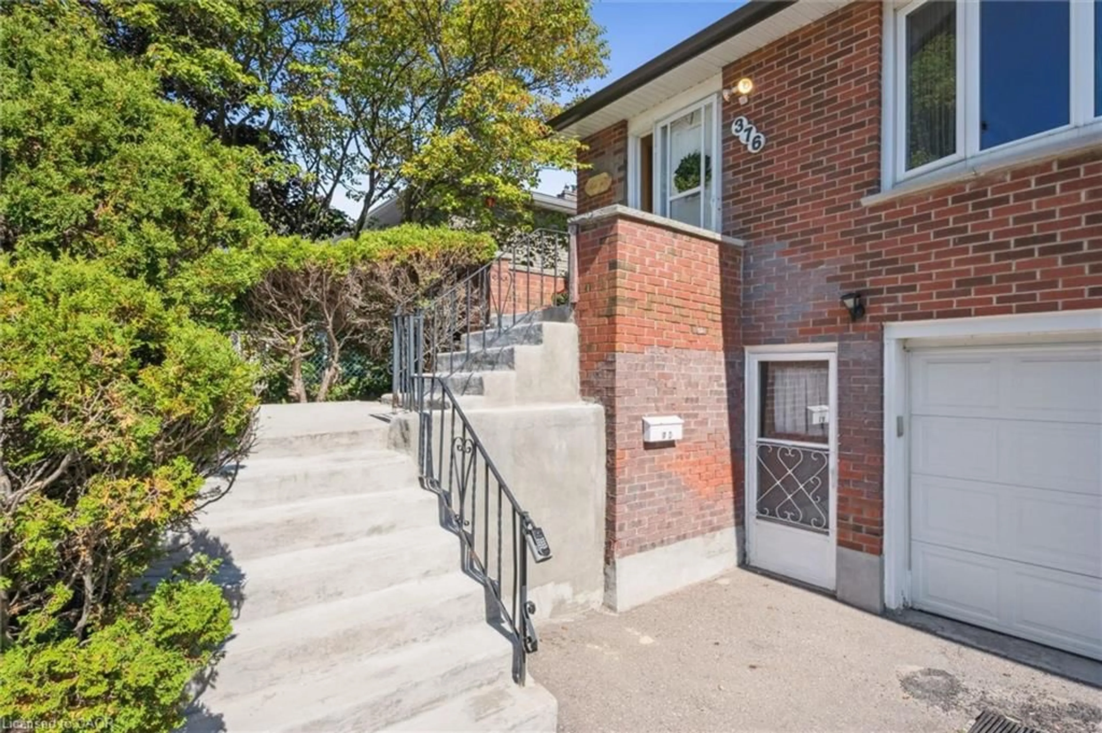 Home with brick exterior material, street for 376 Westwood Dr, Kitchener Ontario N2M 2L6