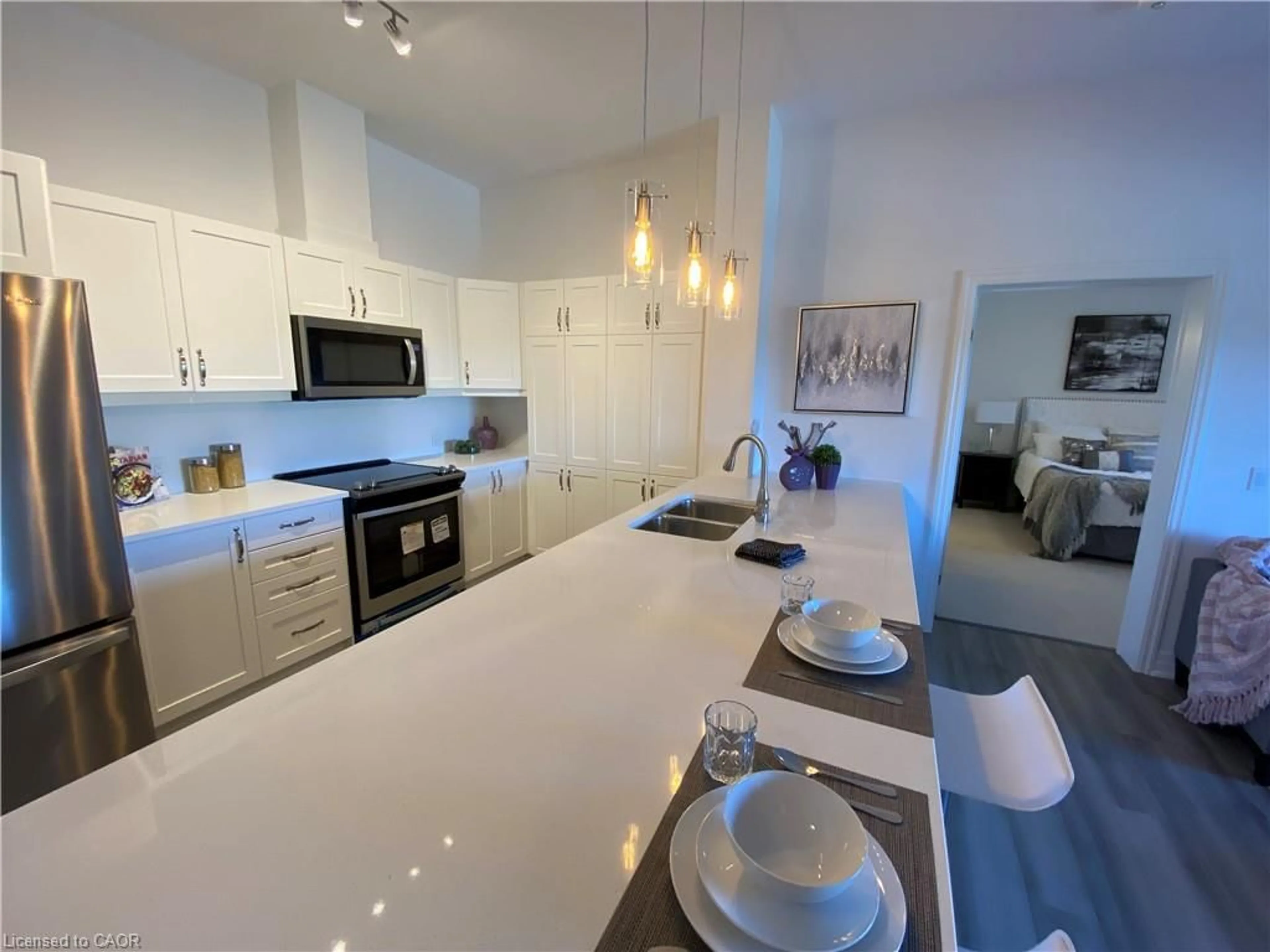 Open concept kitchen, ceramic/tile floor for 39 Sister Varga Terr #403, Hamilton Ontario L9B 0J7